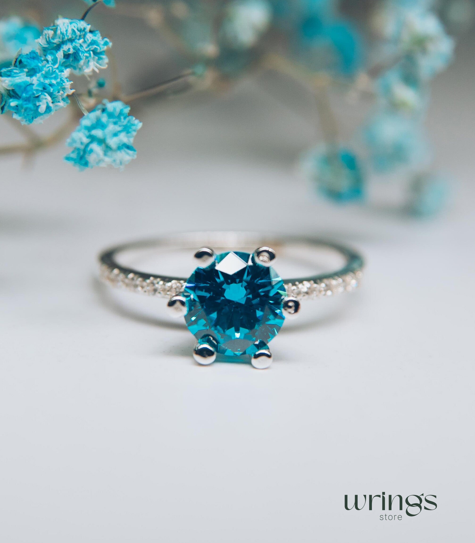 Large Round Swiss Blue Topaz Engagement Ring & Side CZ