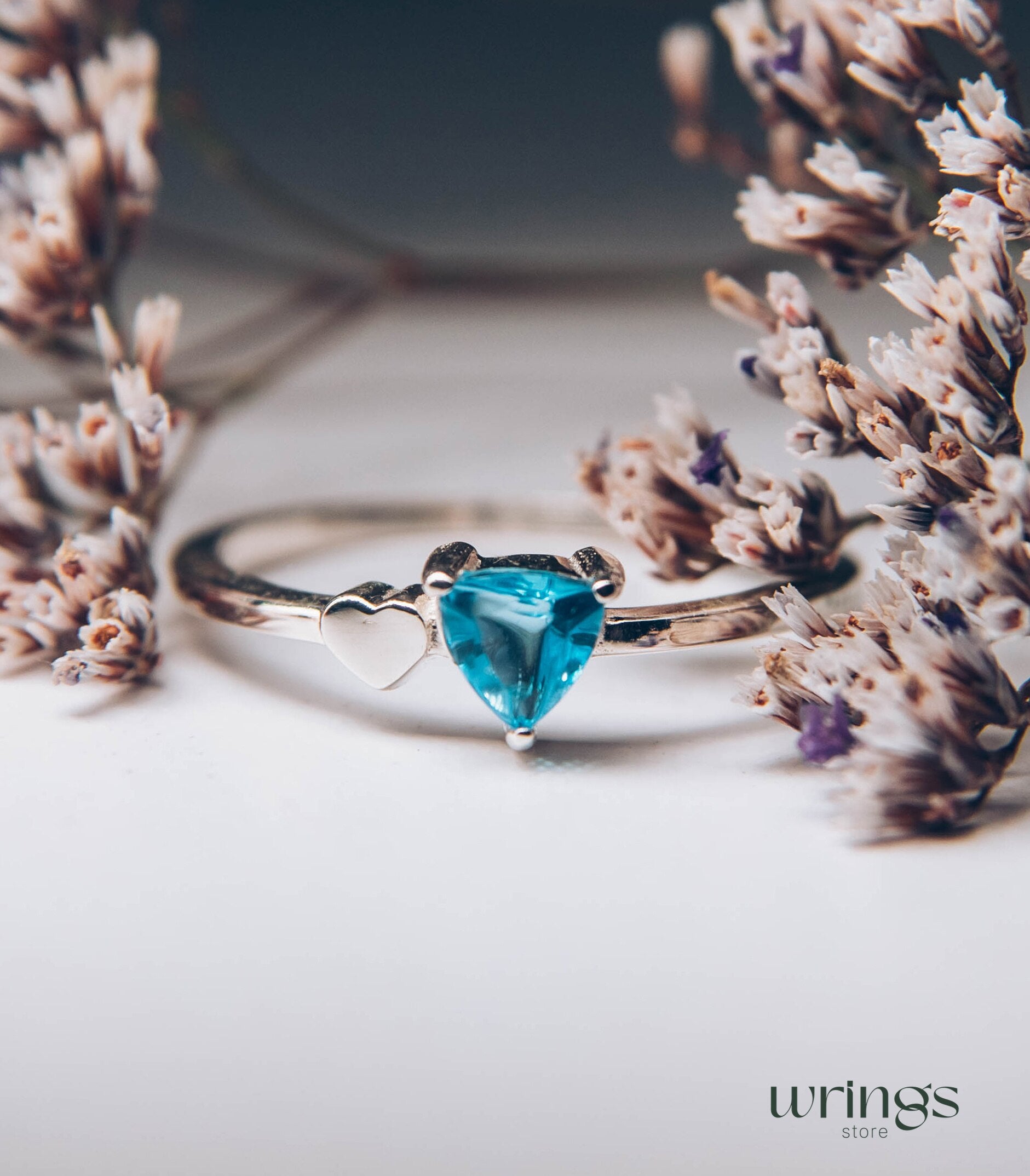 Trillion Swiss Blue Topaz Engagement Ring with Side Heart