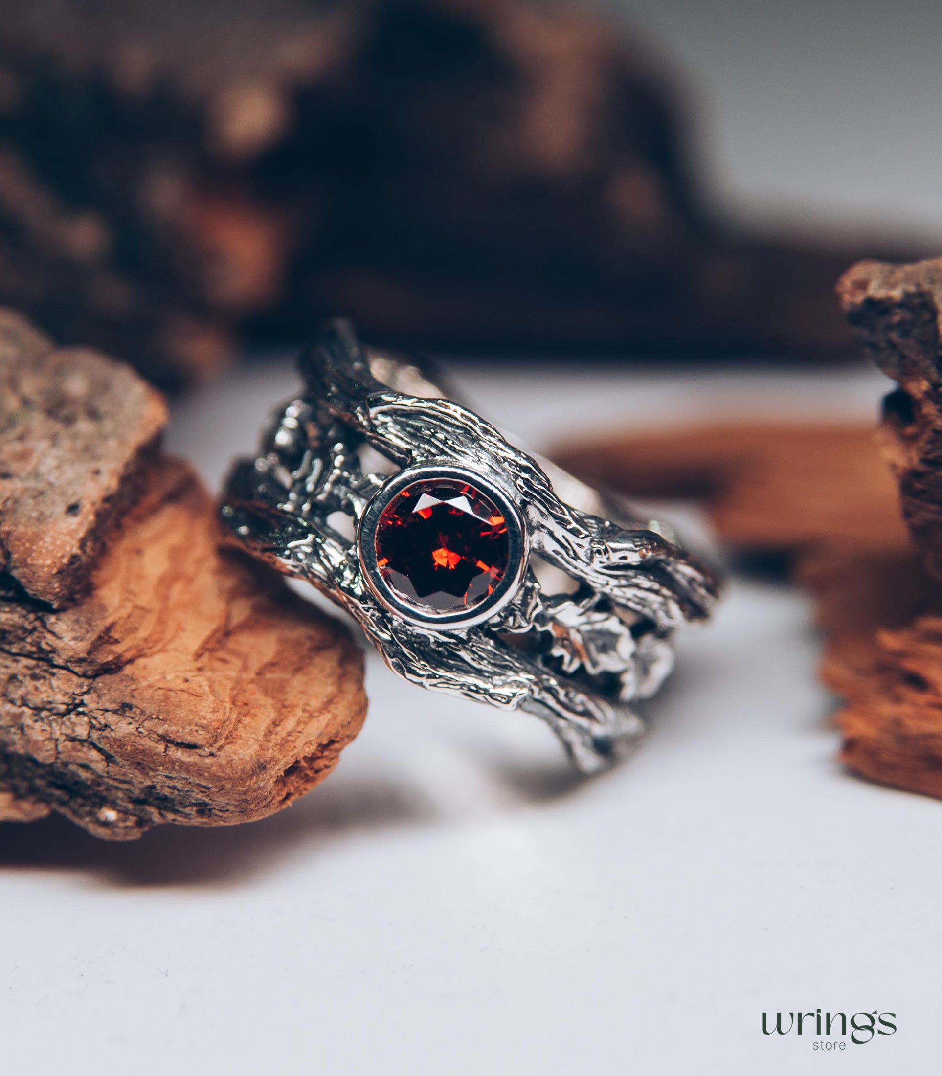 Oak Leaves in Wide Silver Ring with Bezel Garnet