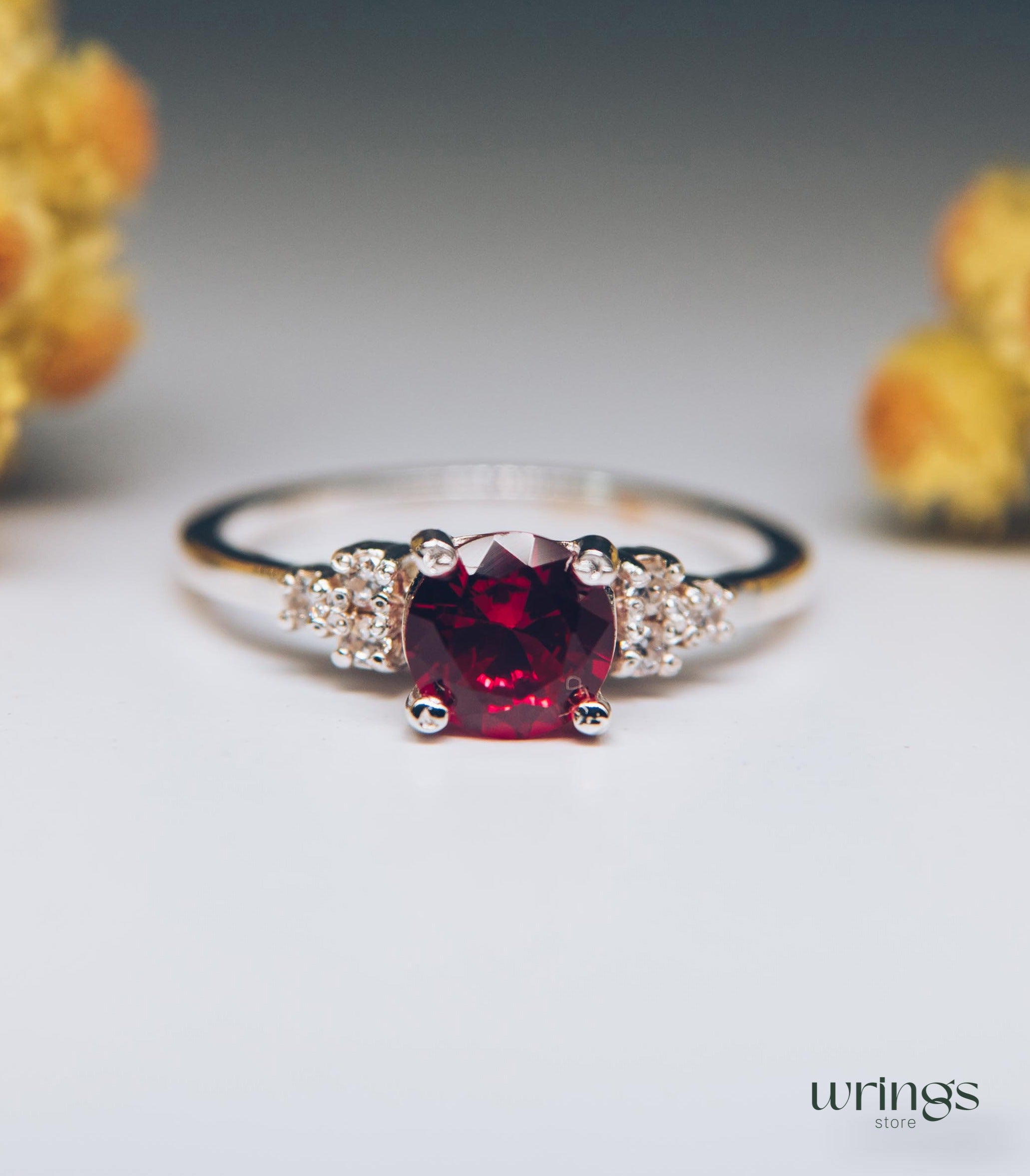 Large Simulated Ruby Engagement Ring Cluster Side Stones