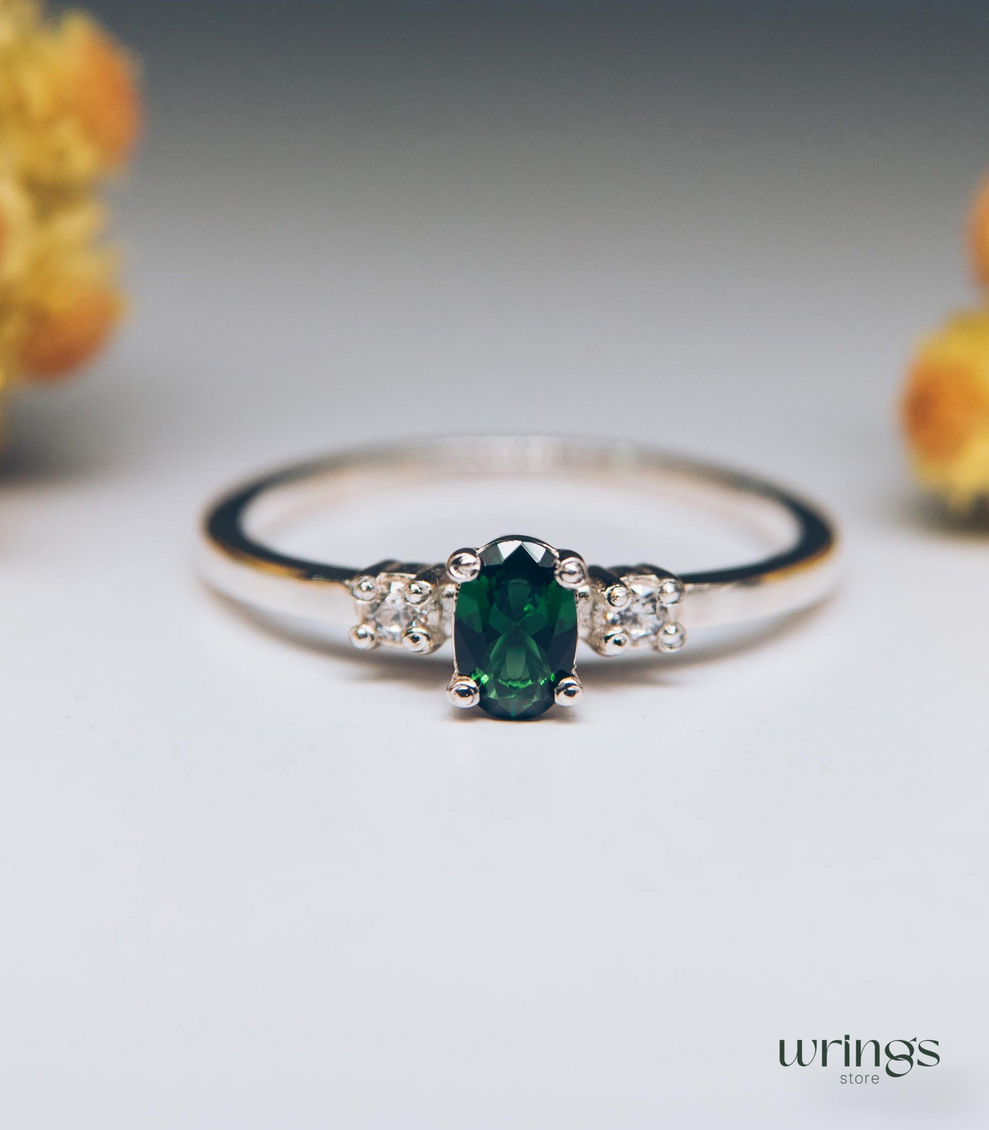 Vertical Oval LG Green Tourmaline Ring & Side Stones