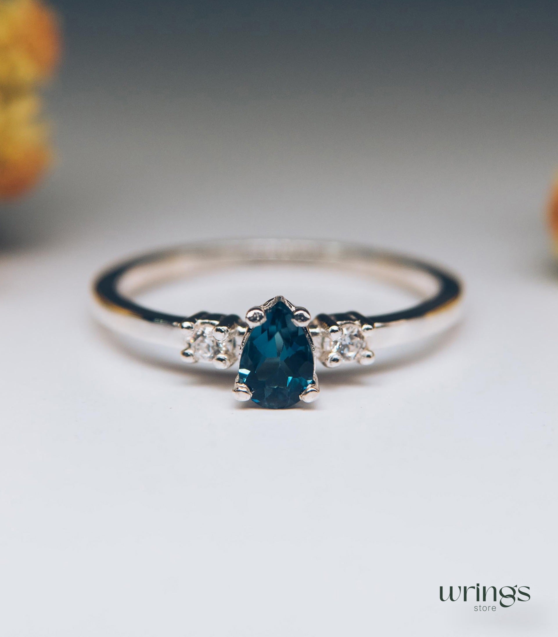 Central Pear London Blue Topaz 3 Stone Engagement Ring