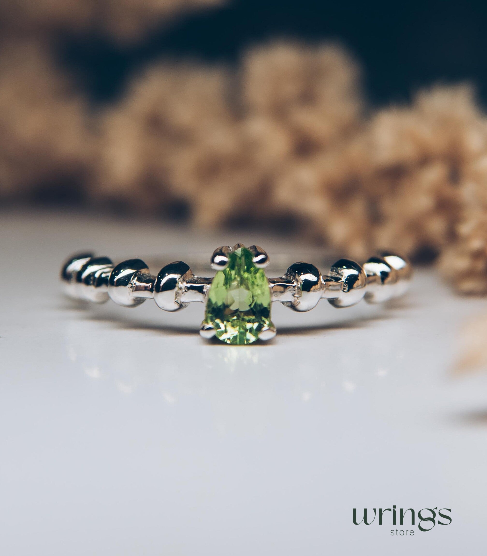 Pear shape Peridot Engagement Ring Silver Beaded Band