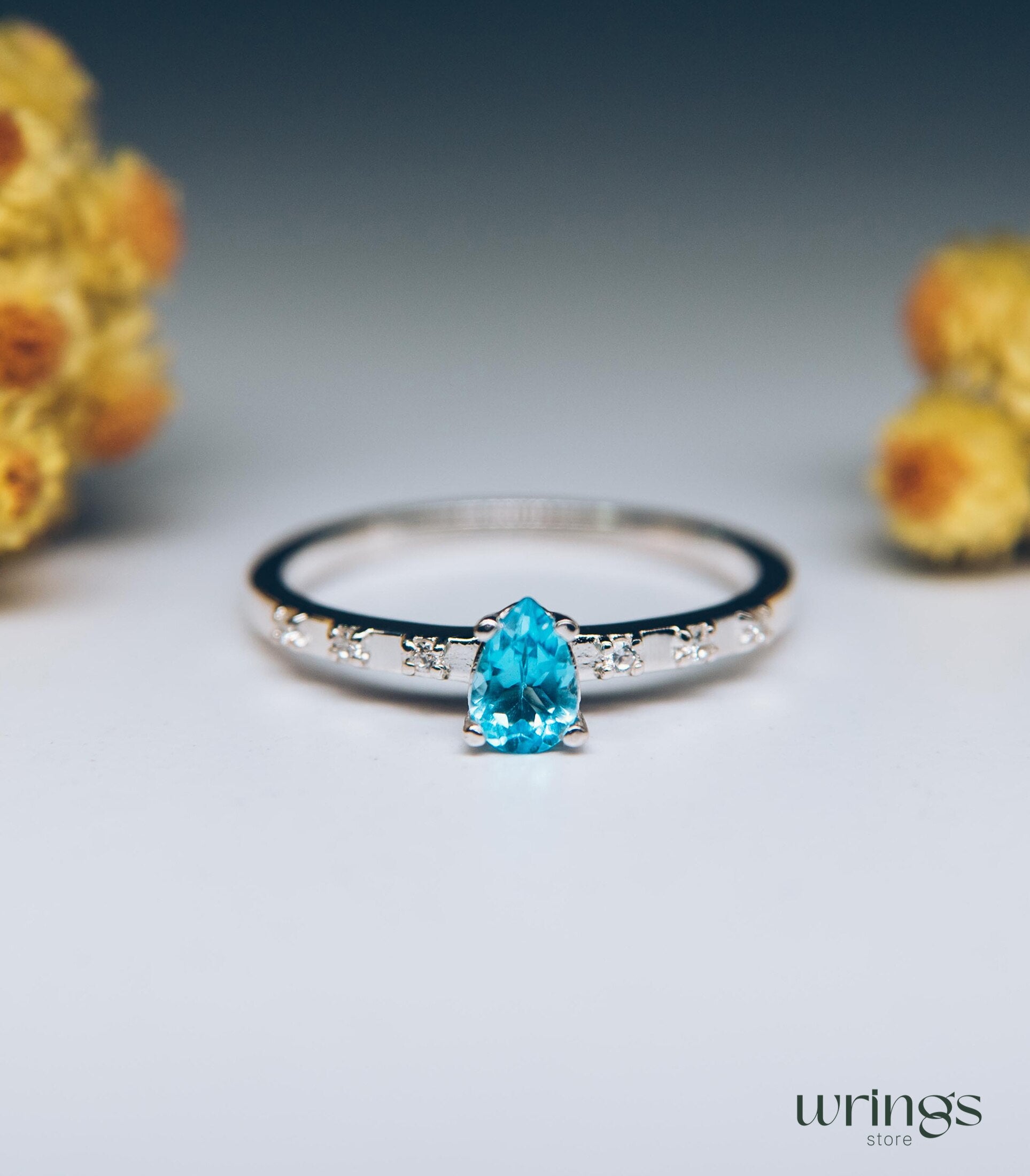 Pear Swiss Blue Topaz Side Stone Engagement Ring Silver