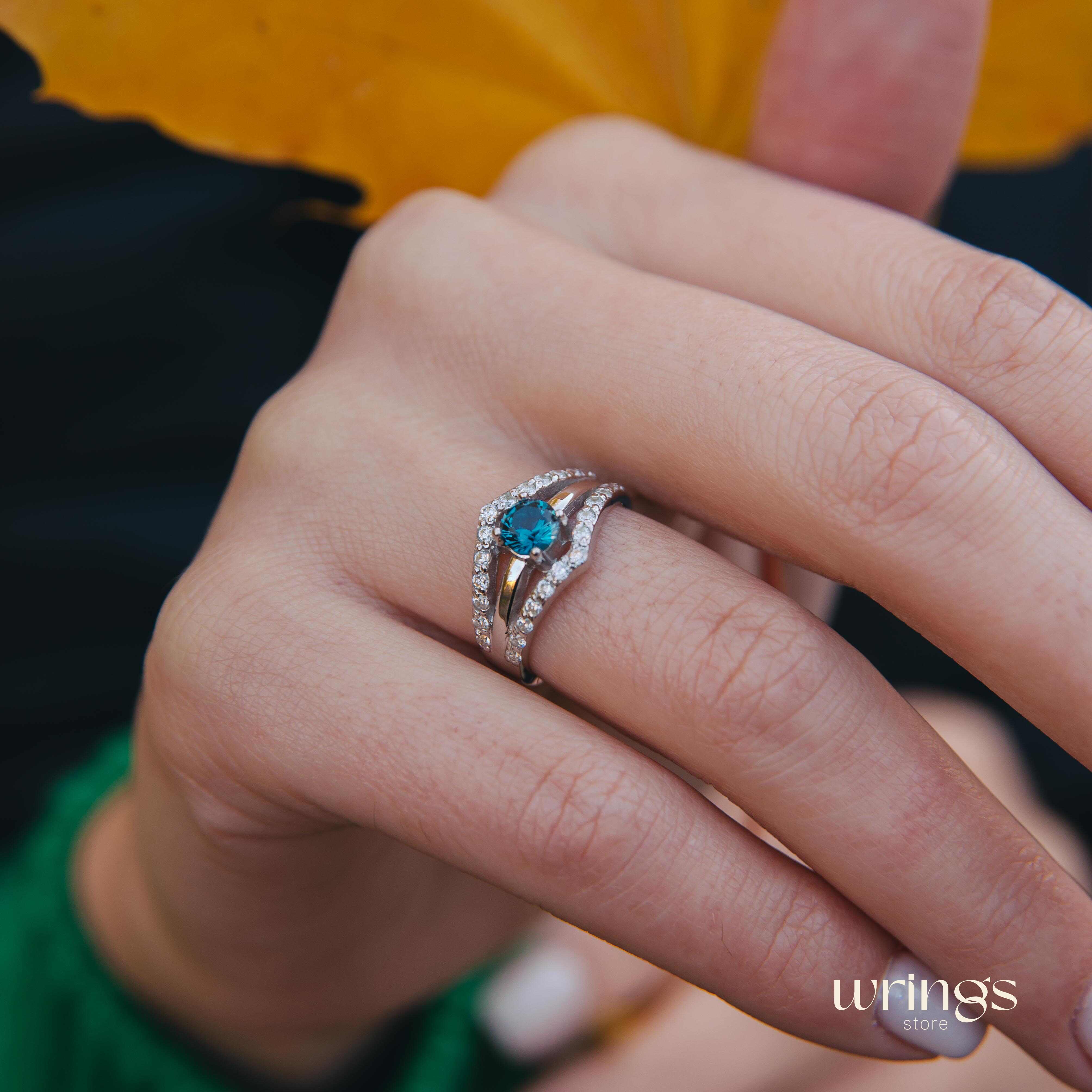 Double Chevron Engagement Ring - Oval Blue Topaz & CZ