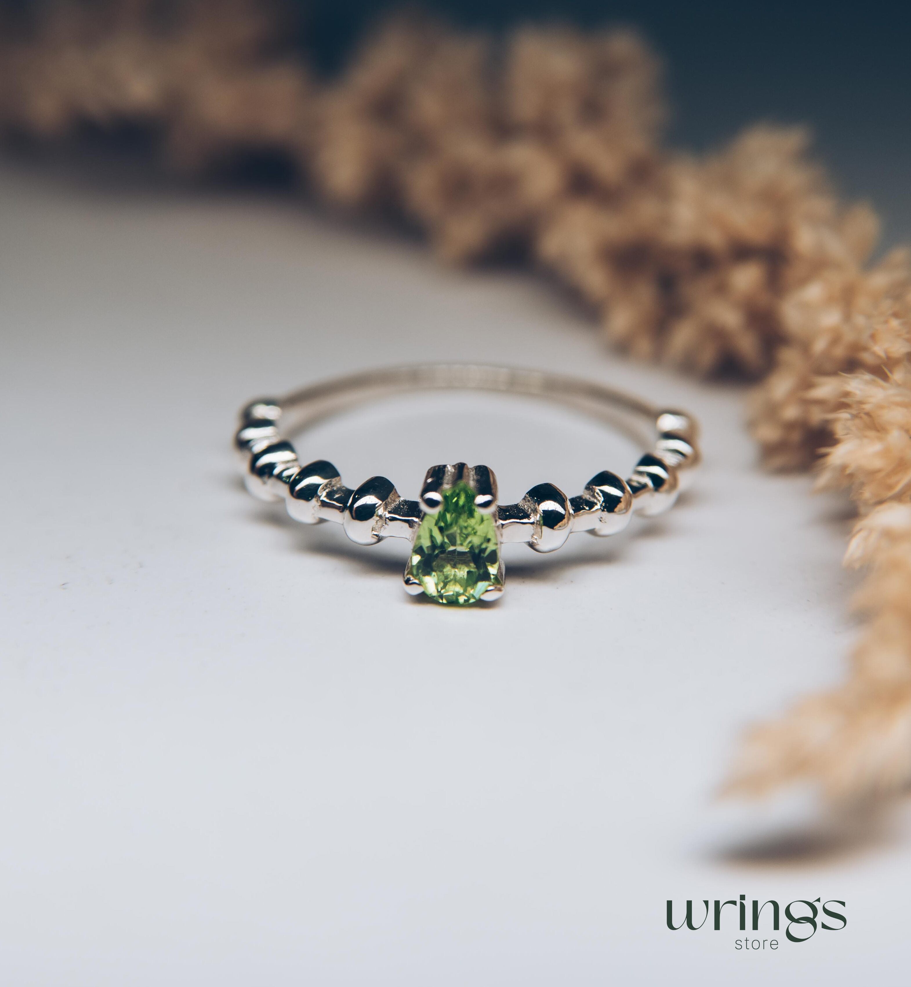 Pear shape Peridot Engagement Ring Silver Beaded Band