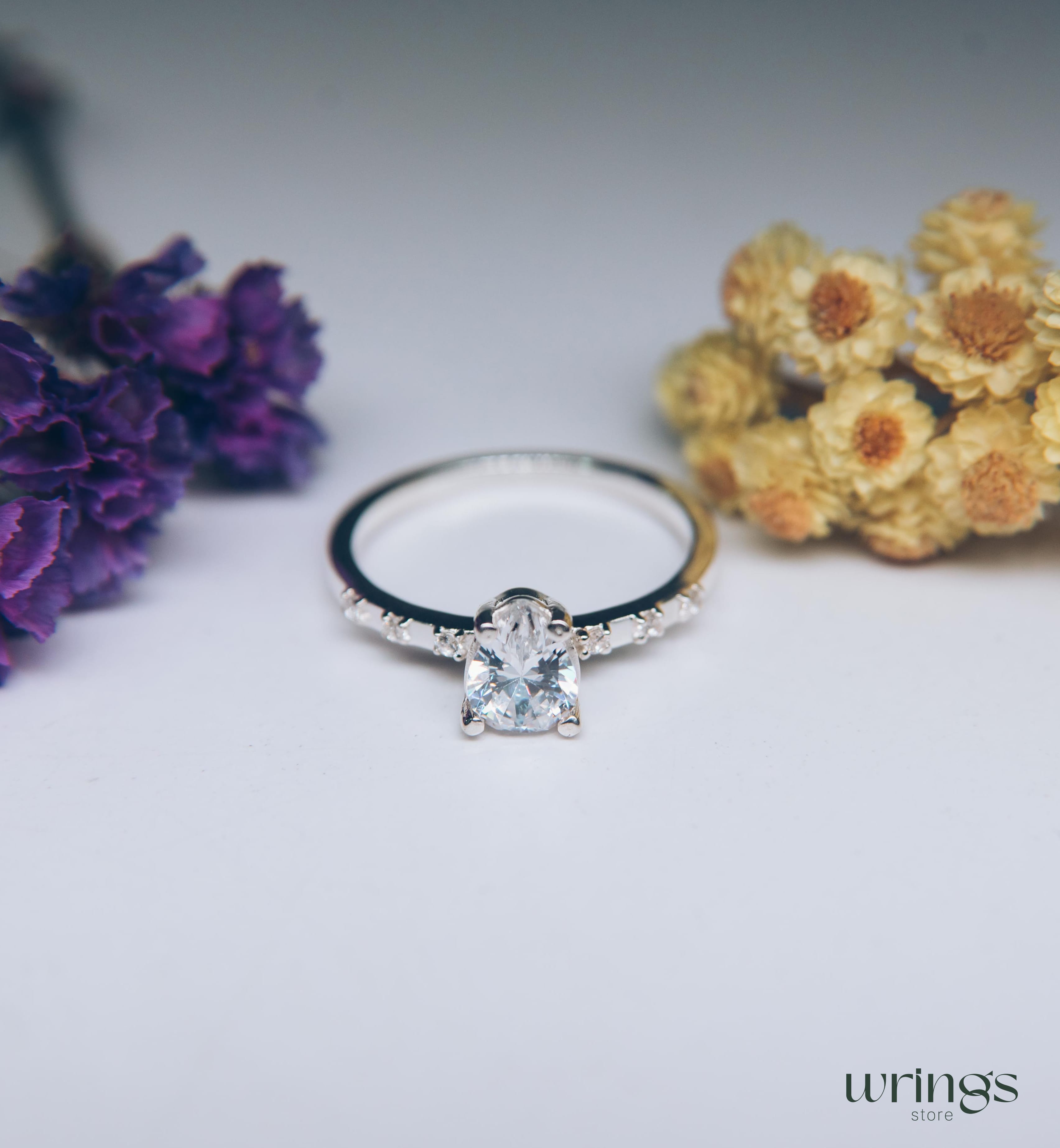 Large Pear Diamond CZ Engagement Ring with Side Stones
