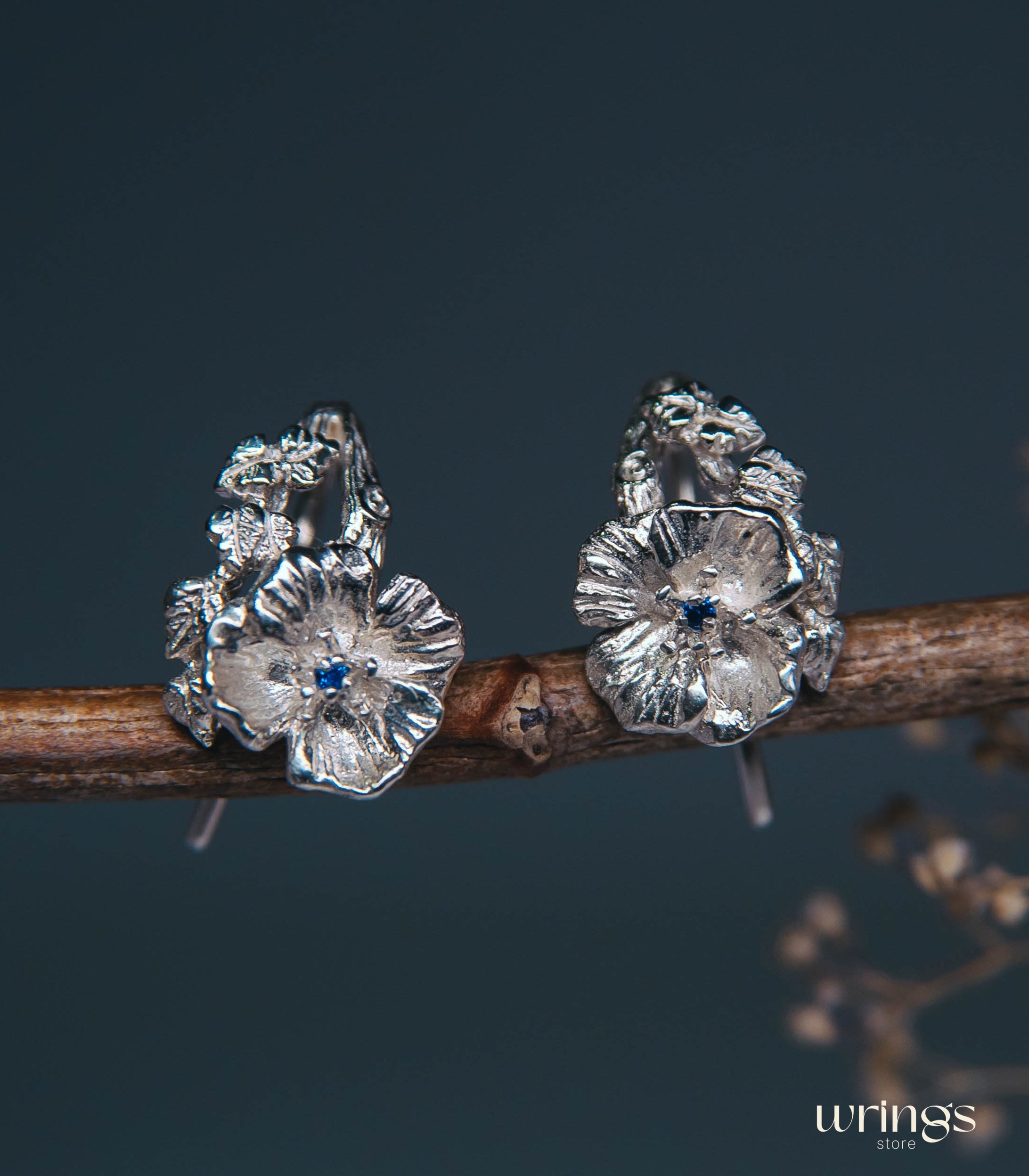 Silver Poppy Flower Earrings with Blue Sapphire