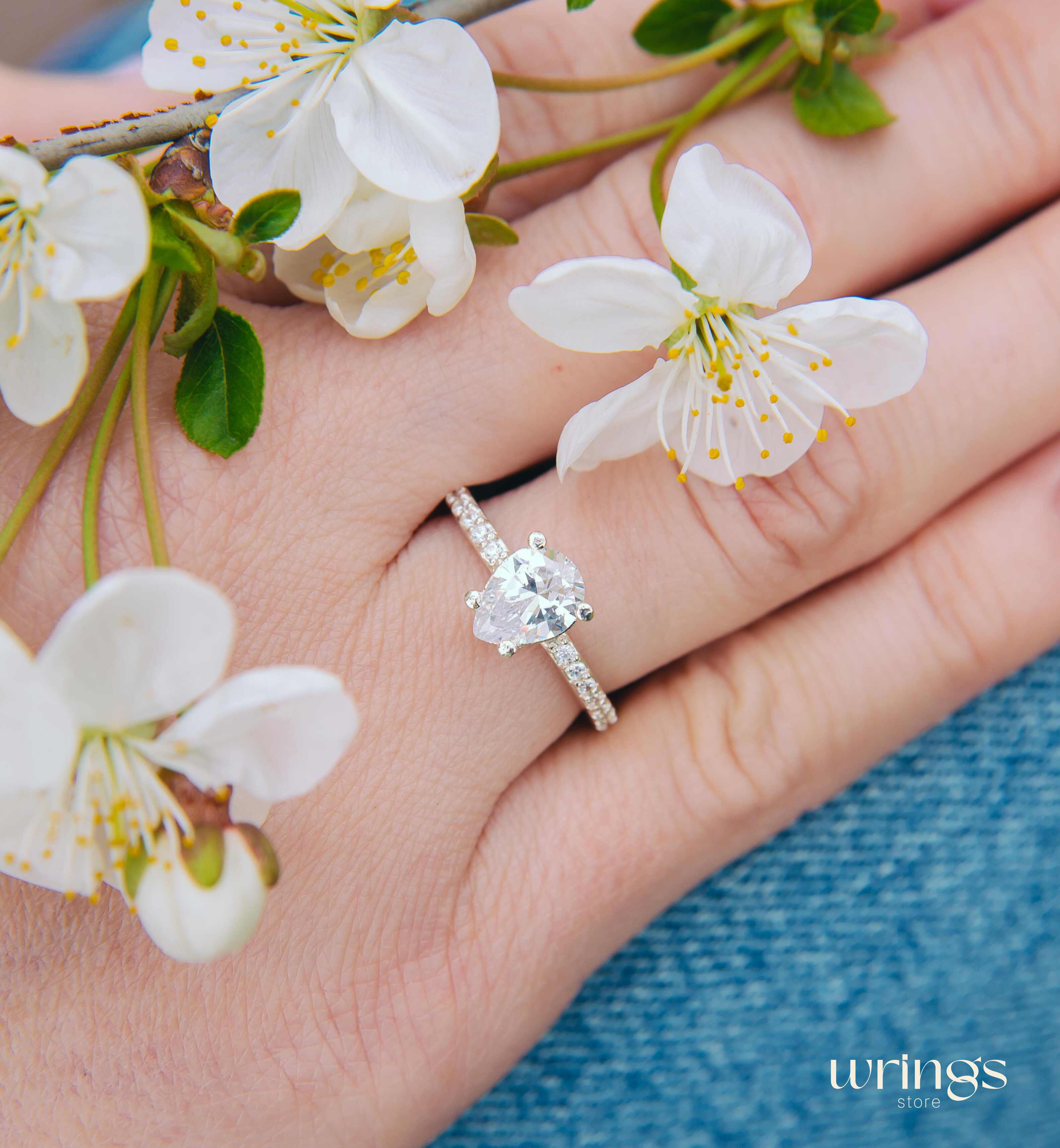 Large Pear White Stone & CZ Side Stones Engagement Ring