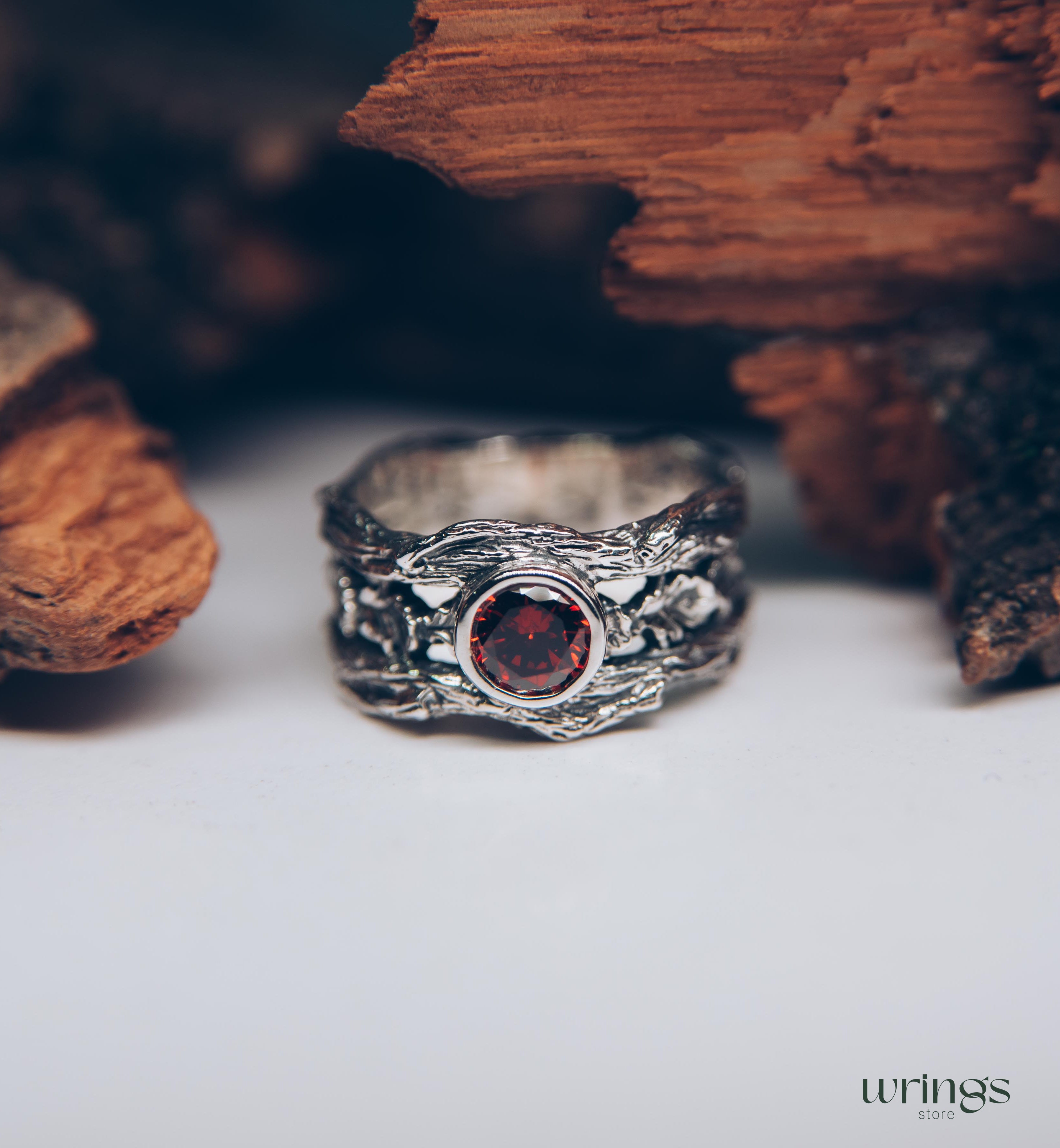 Oak Leaves in Wide Silver Ring with Bezel Garnet