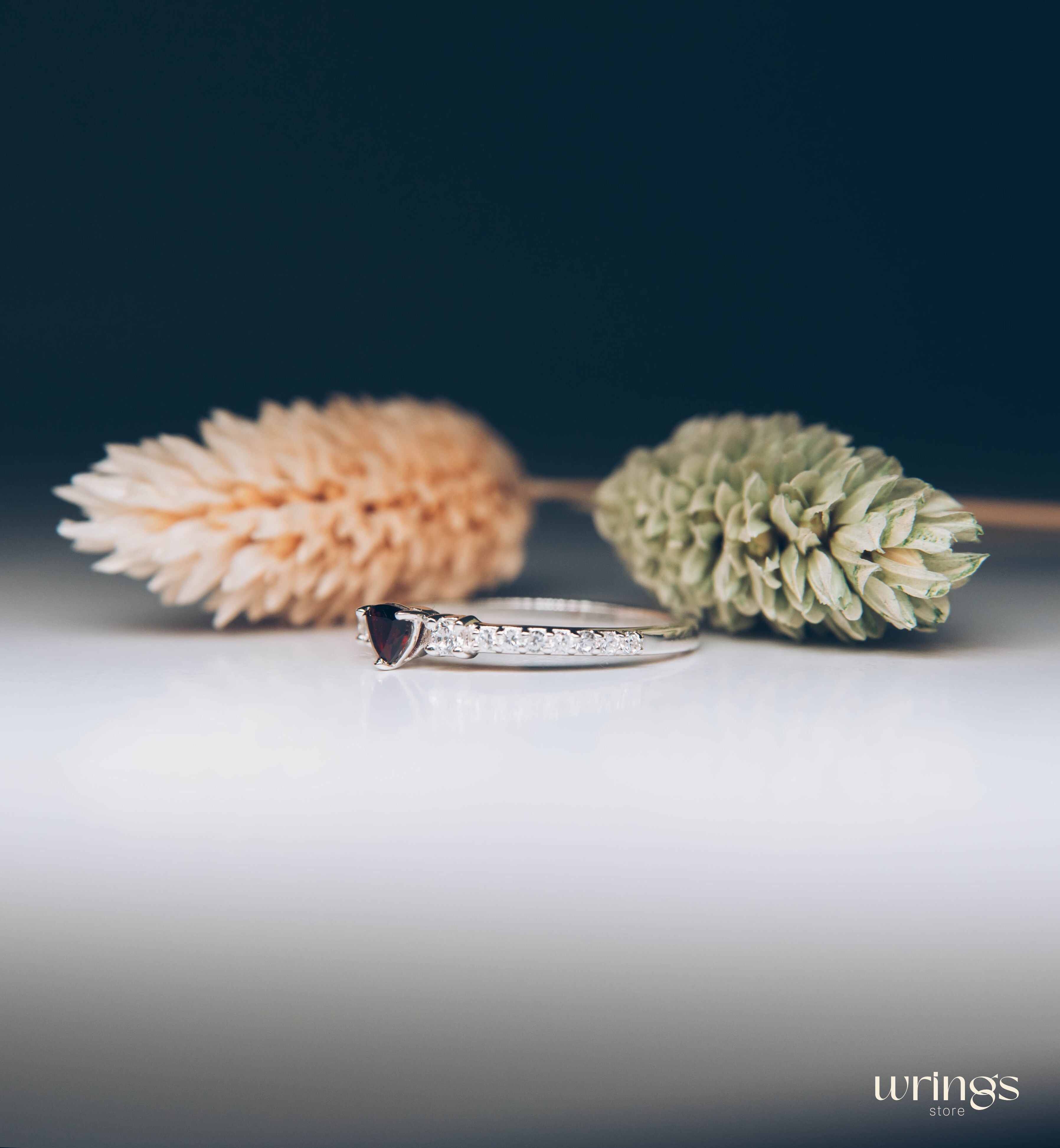3 Stone Garnet Ring - Triillion central Gem & Side Zirconia