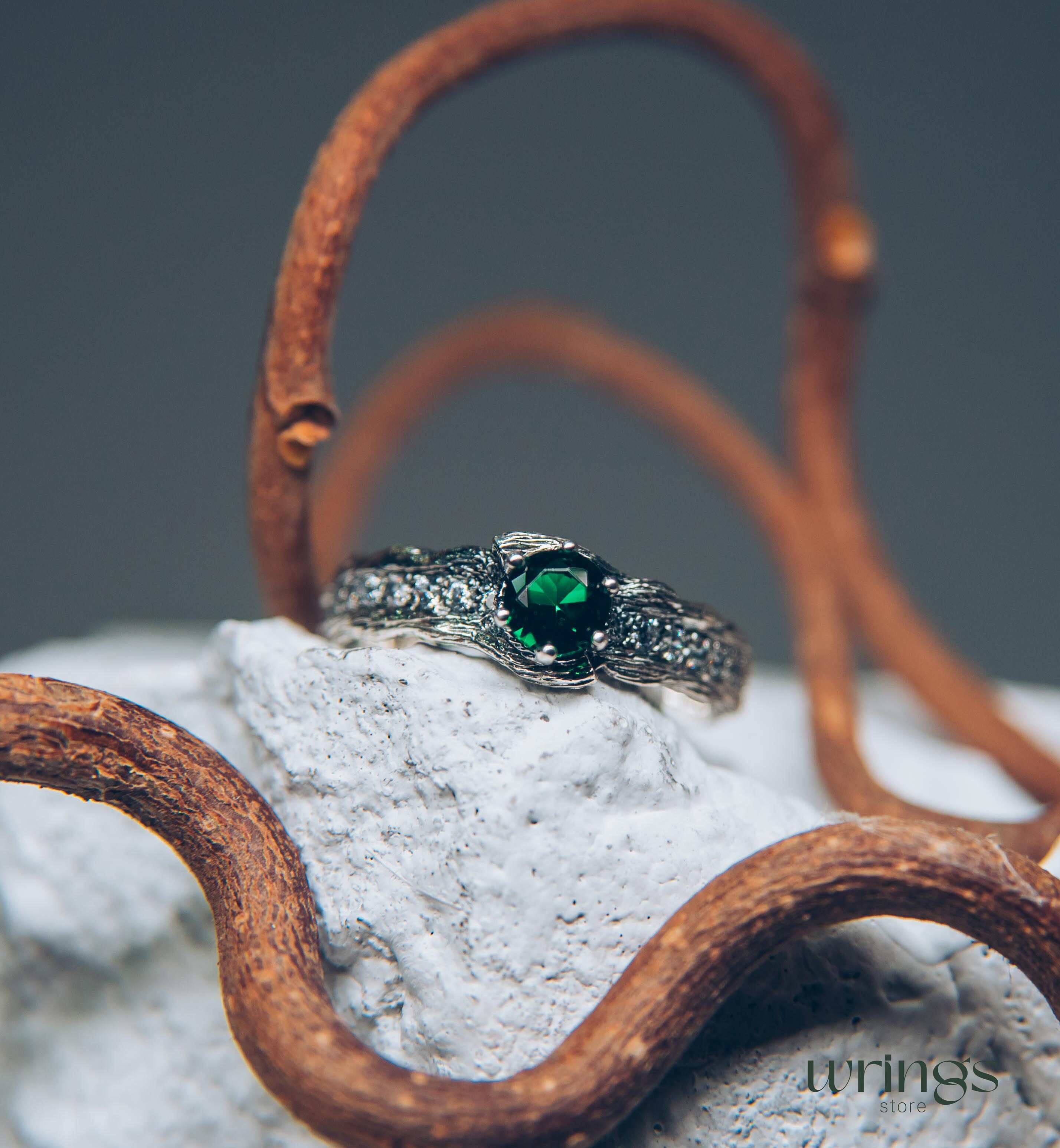 Gorgeous Emerald Ring with multiple Accent Stones