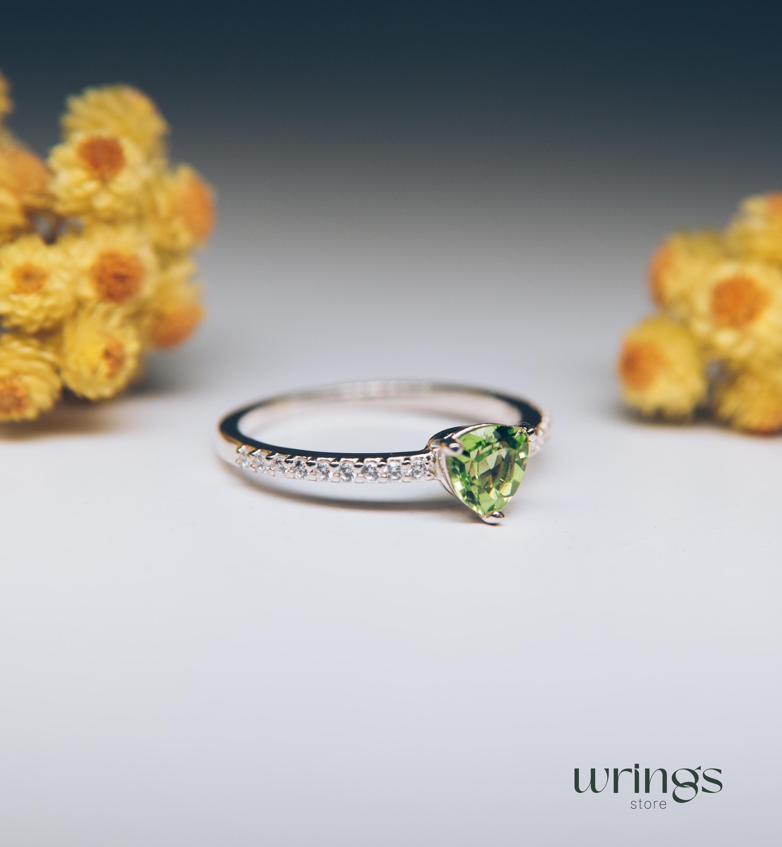 Trilliant Peridot Engagement Ring & CZ Side Stones