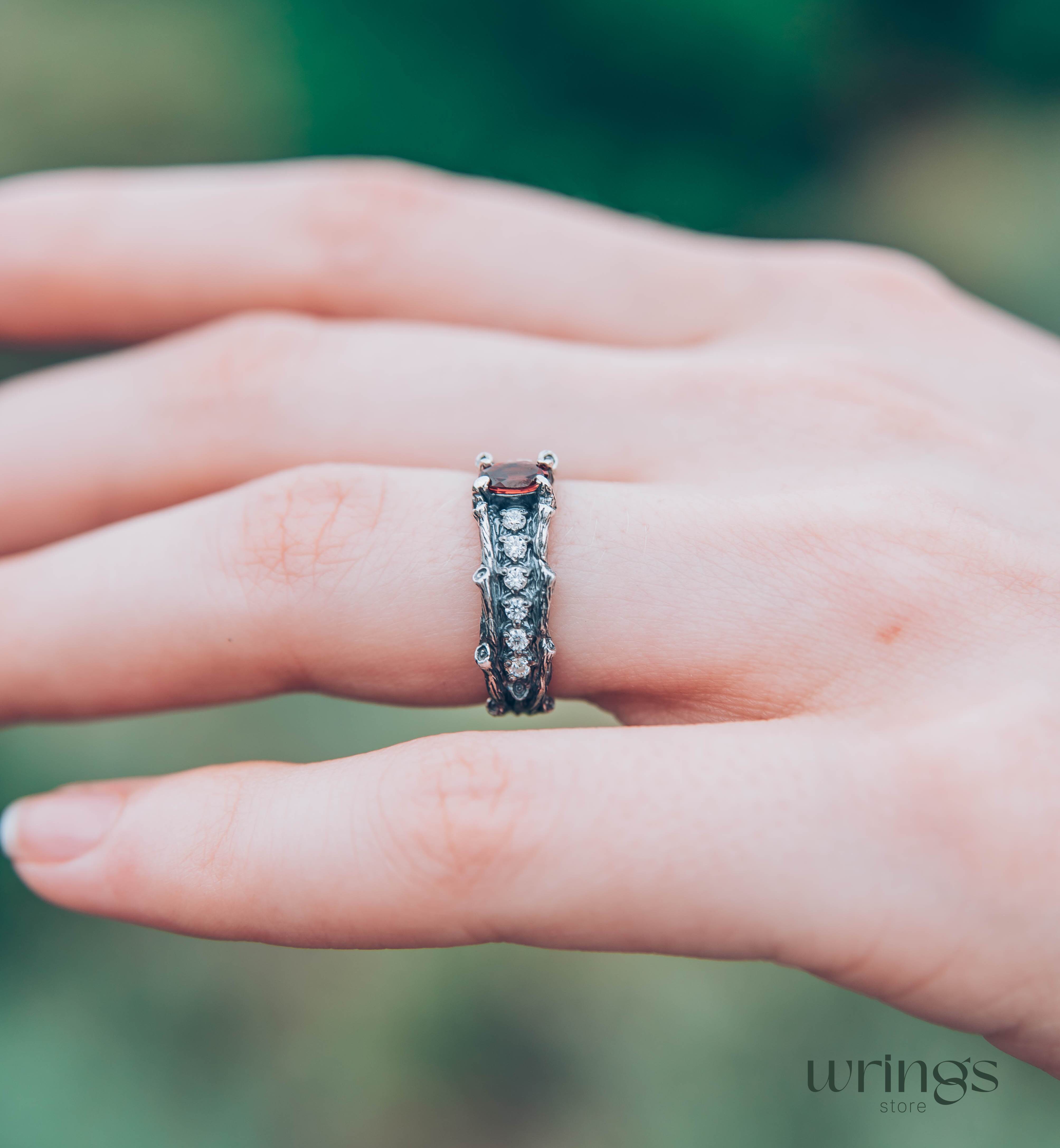 Knot and Branch Garnet Engagement Ring with Side Stones