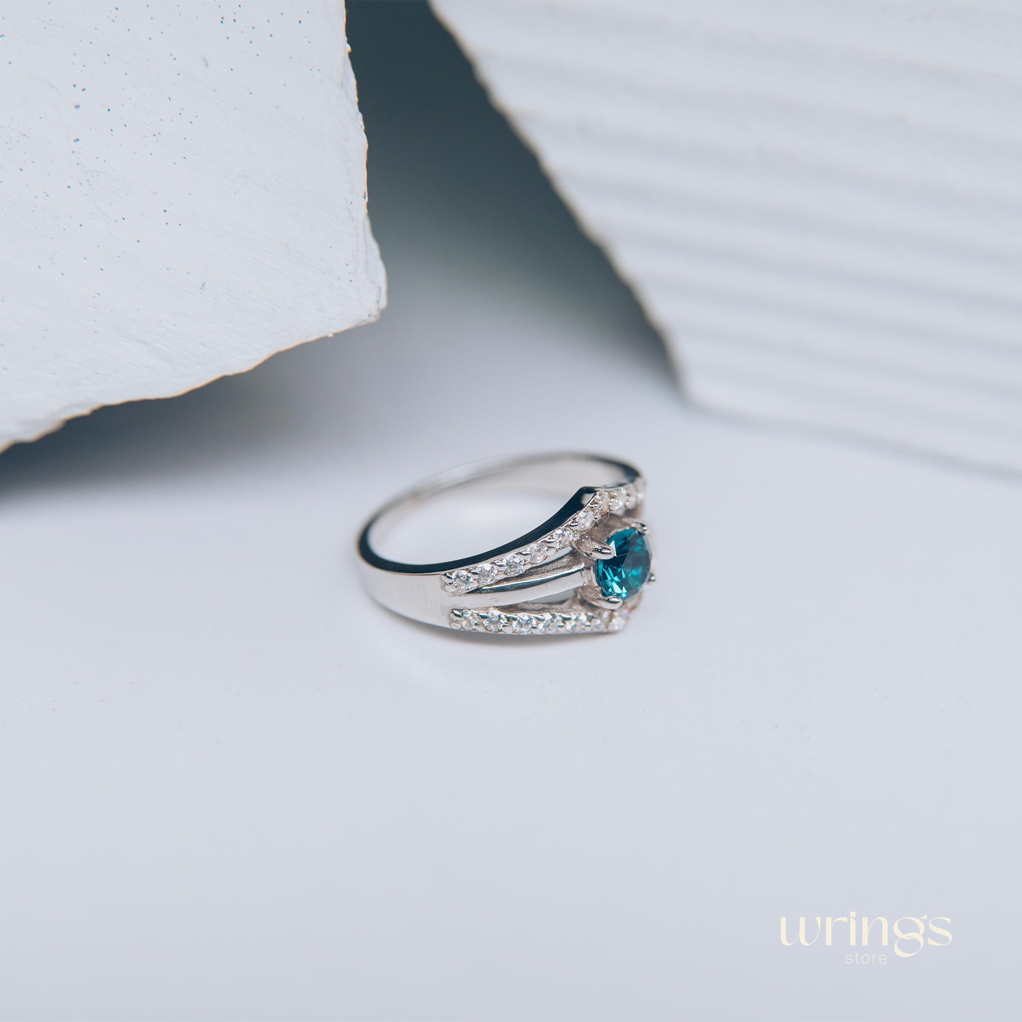 Double Chevron Engagement Ring - Oval Blue Topaz & CZ