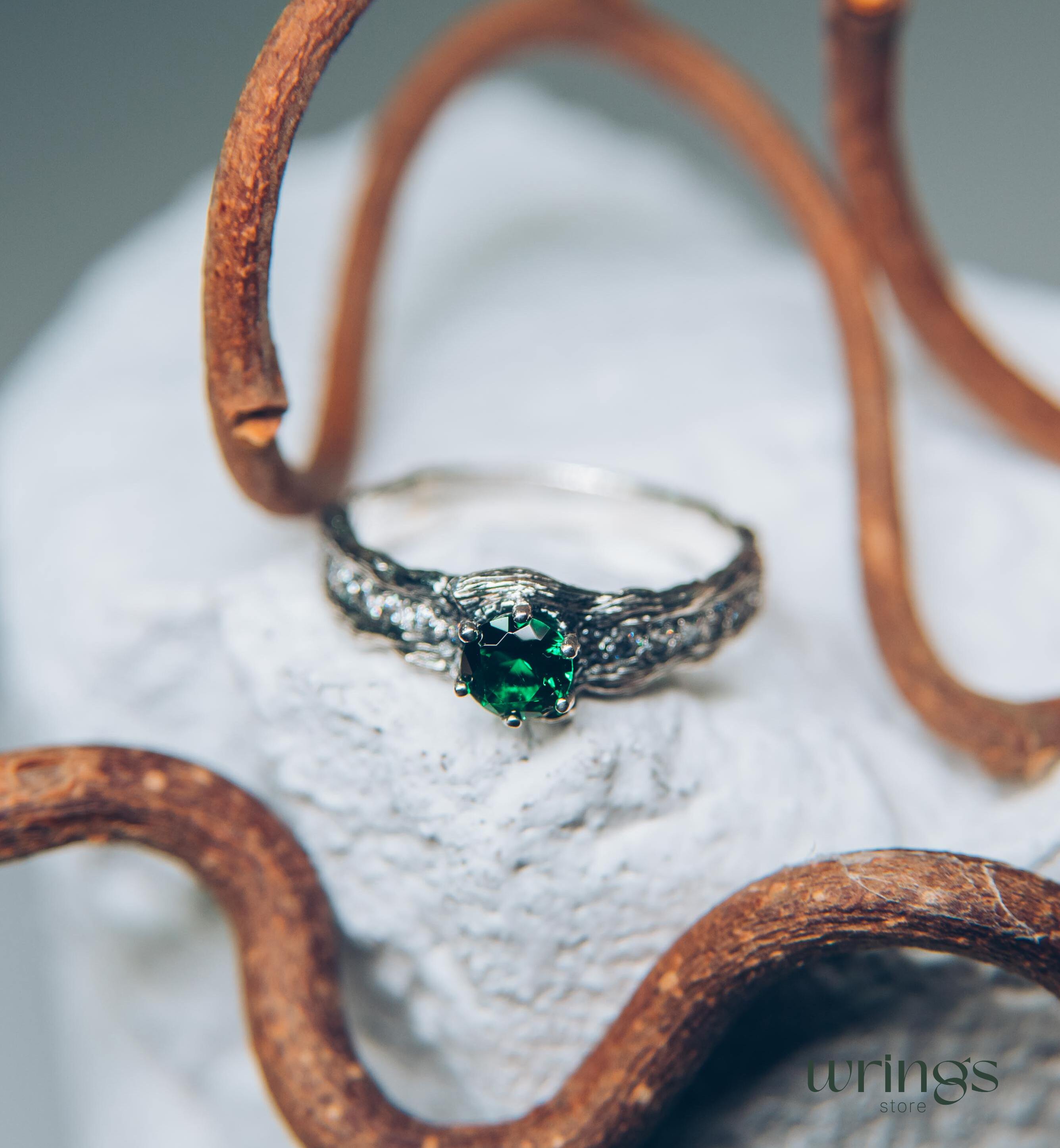 Gorgeous Emerald Ring with multiple Accent Stones