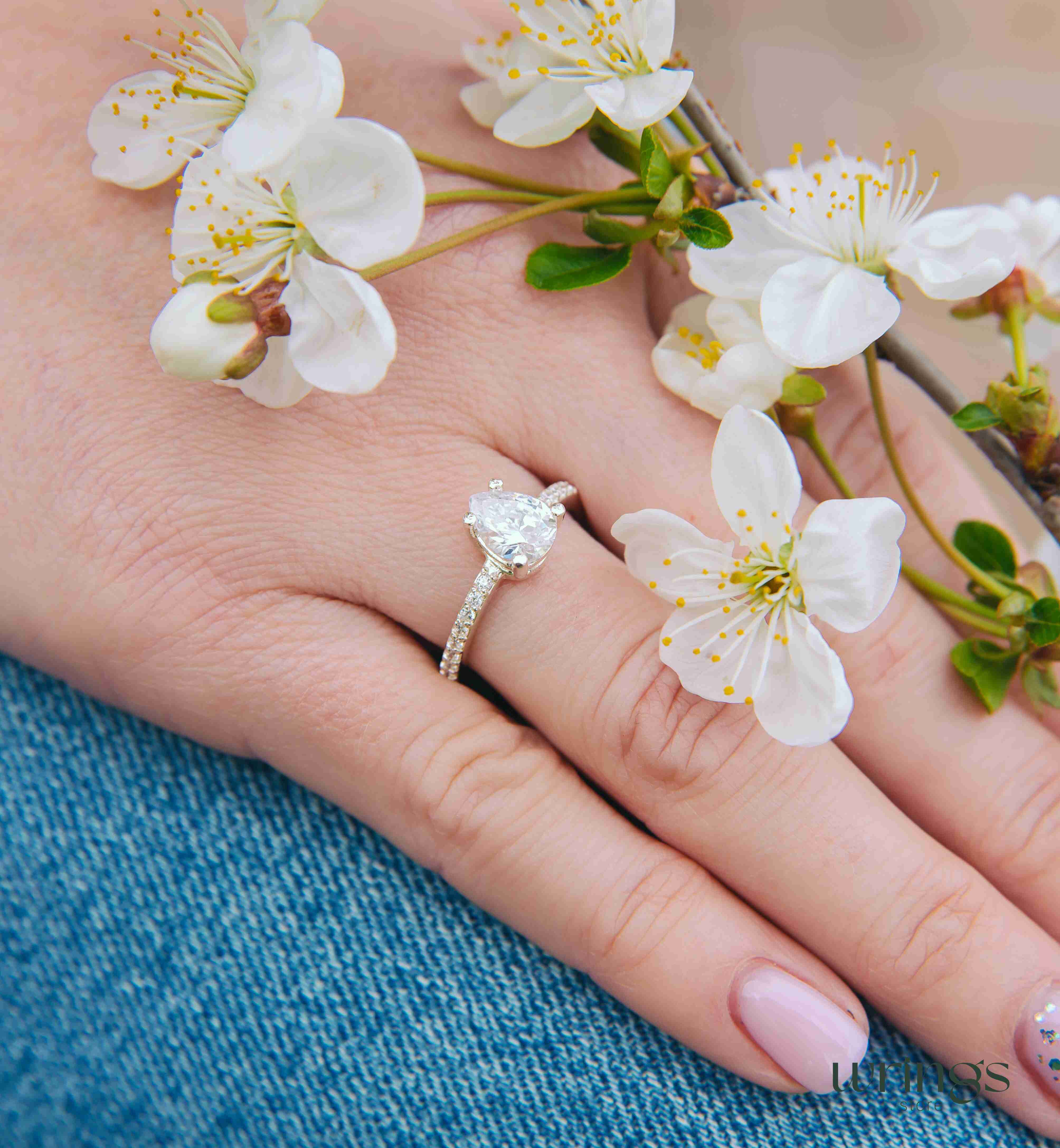 Large Pear White Stone & CZ Side Stones Engagement Ring