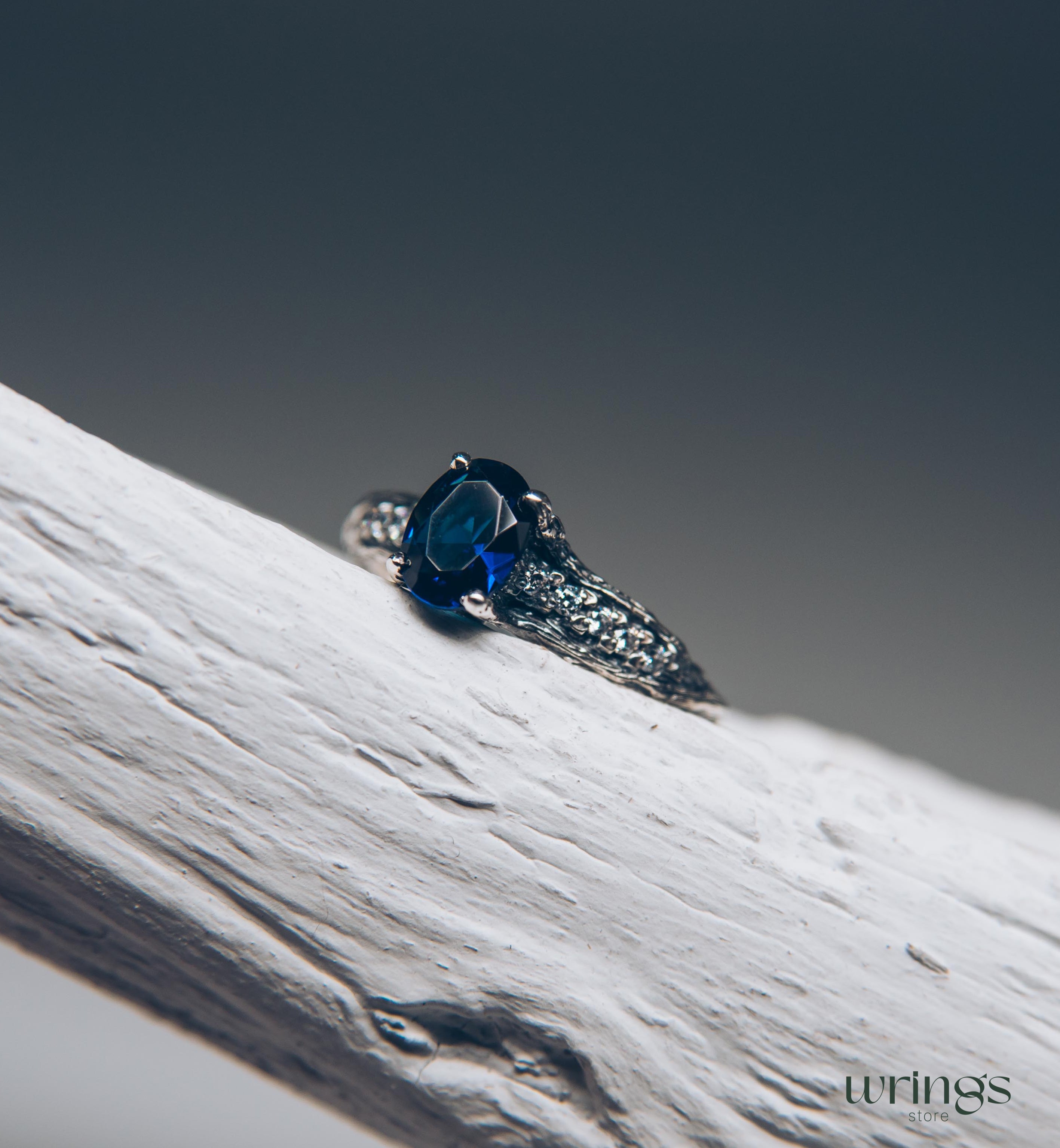 Dainty Oval Sapphire Ring – Side Stones on Silver Branch