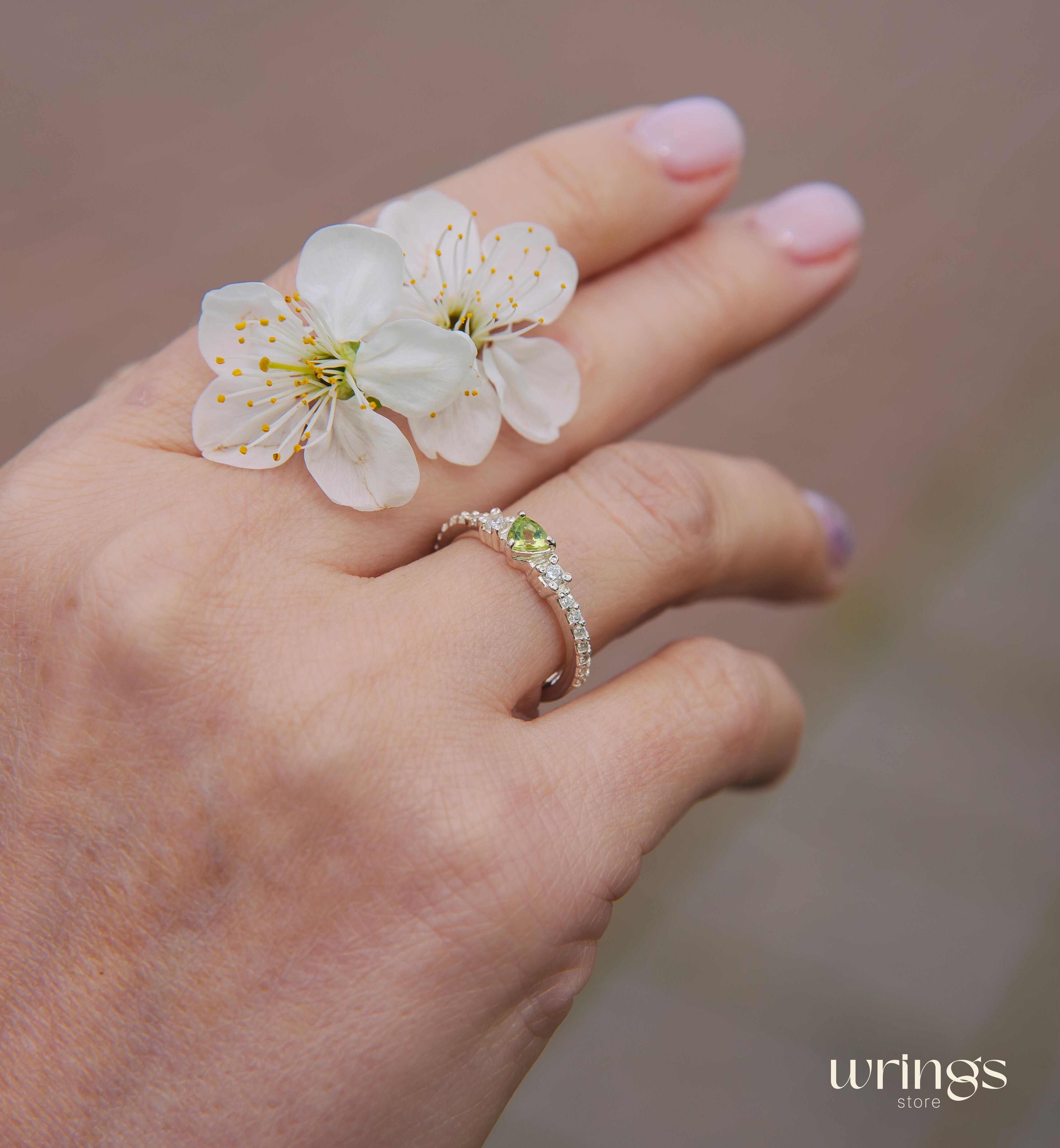 Small Central Peridot Three Stone Engagement Ring