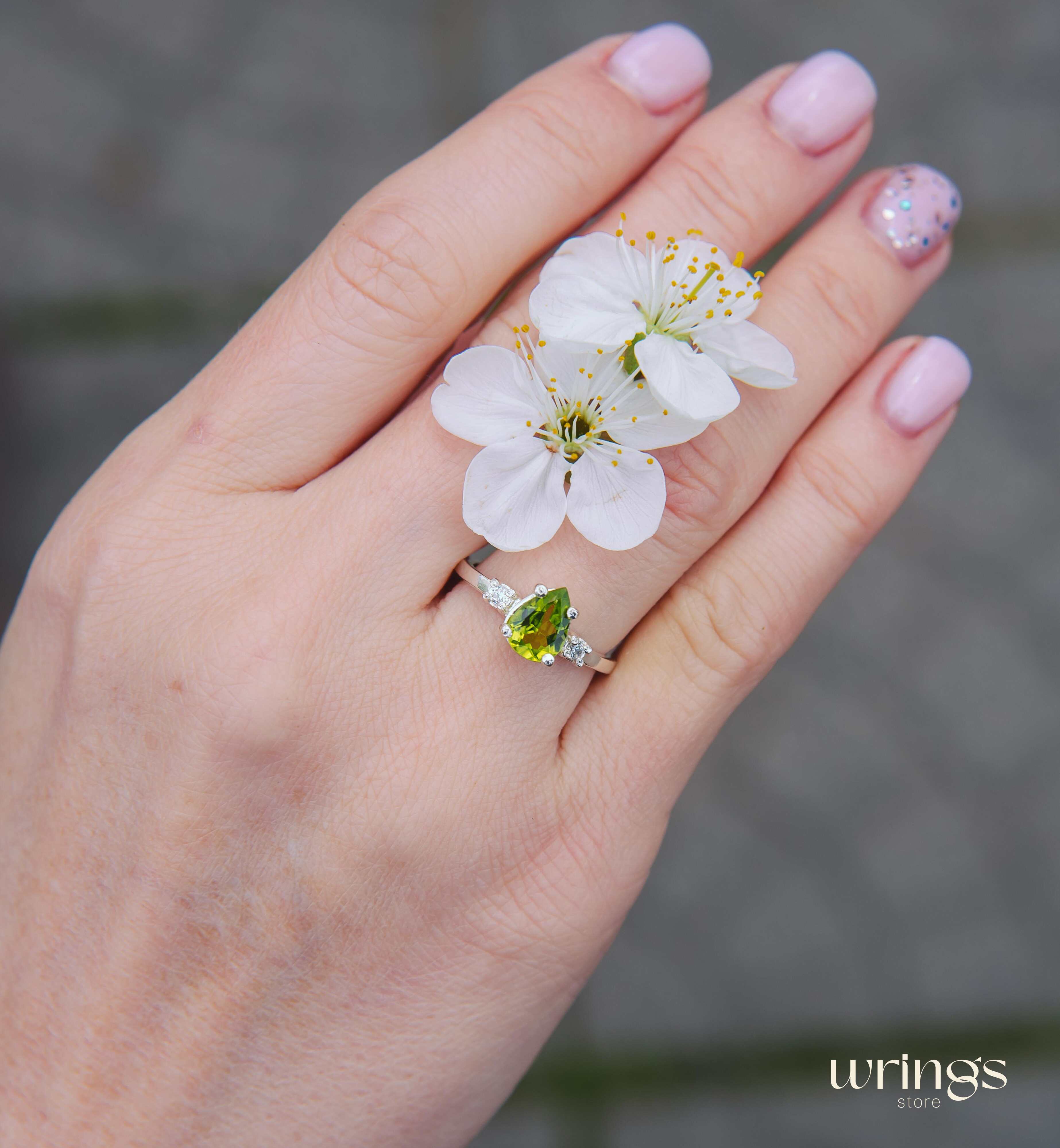 Large Pear Peridot Three Stone Engagement Ring Silver