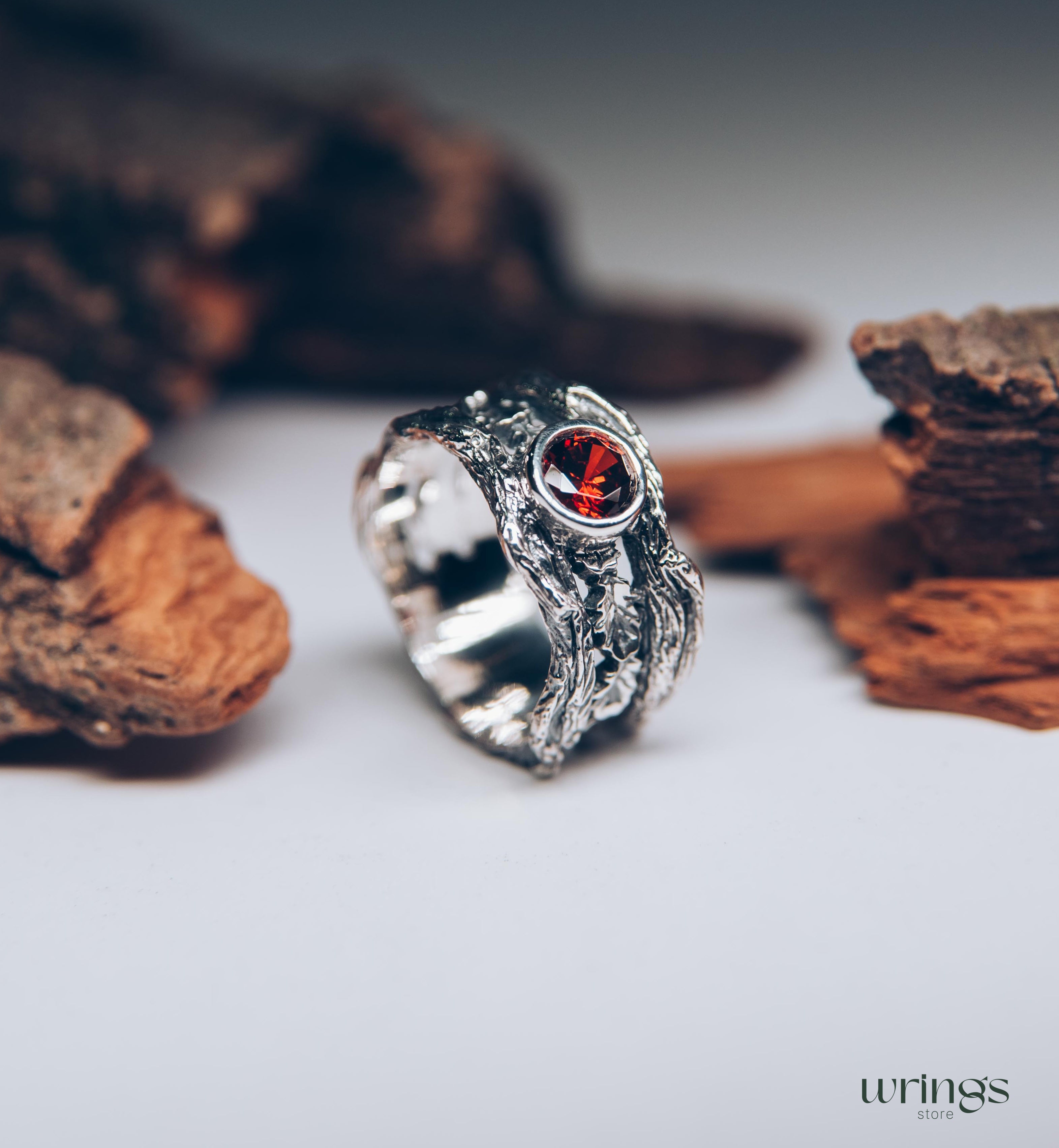 Oak Leaves in Wide Silver Ring with Bezel Garnet