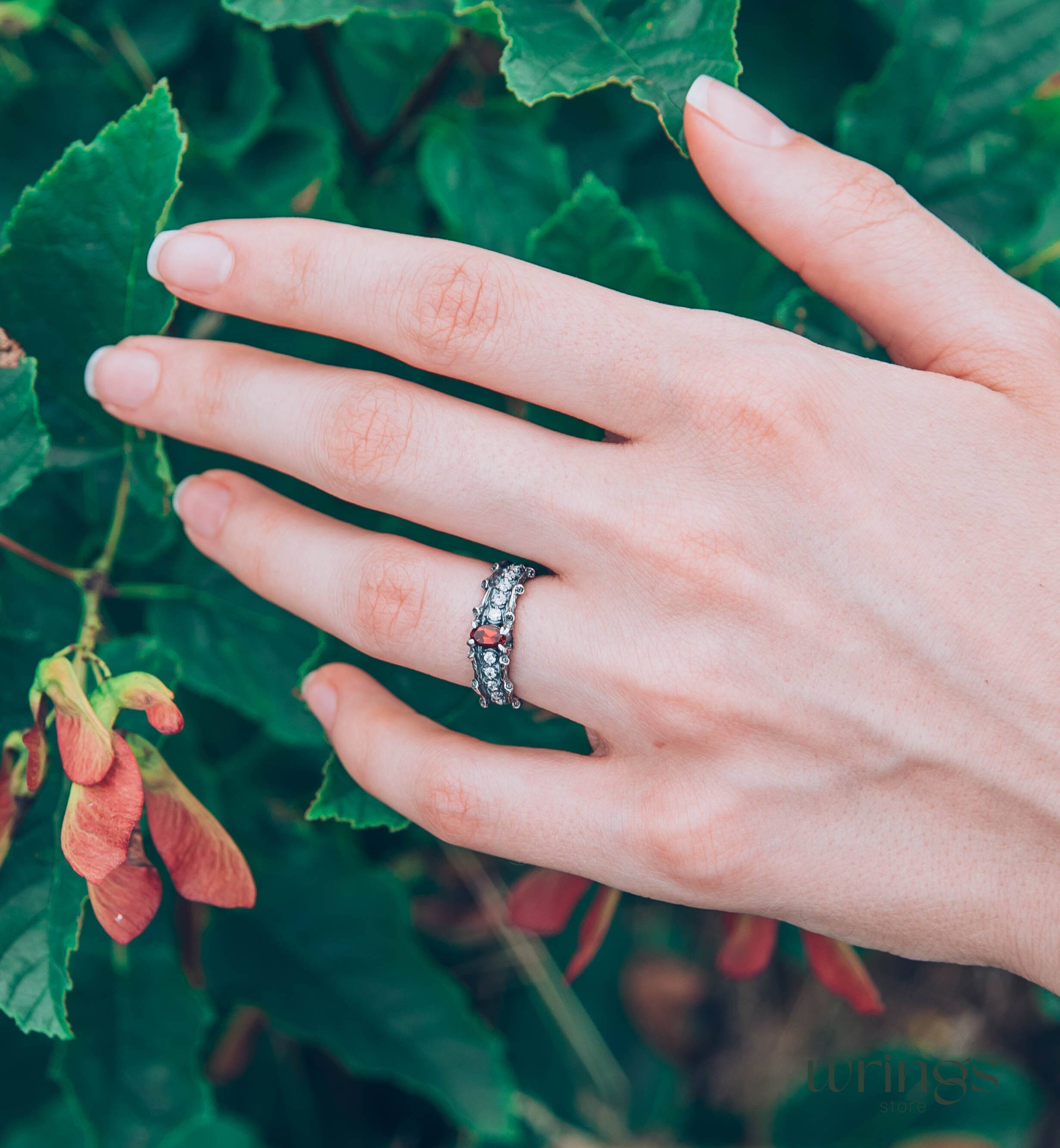 Knot and Branch Garnet Engagement Ring with Side Stones