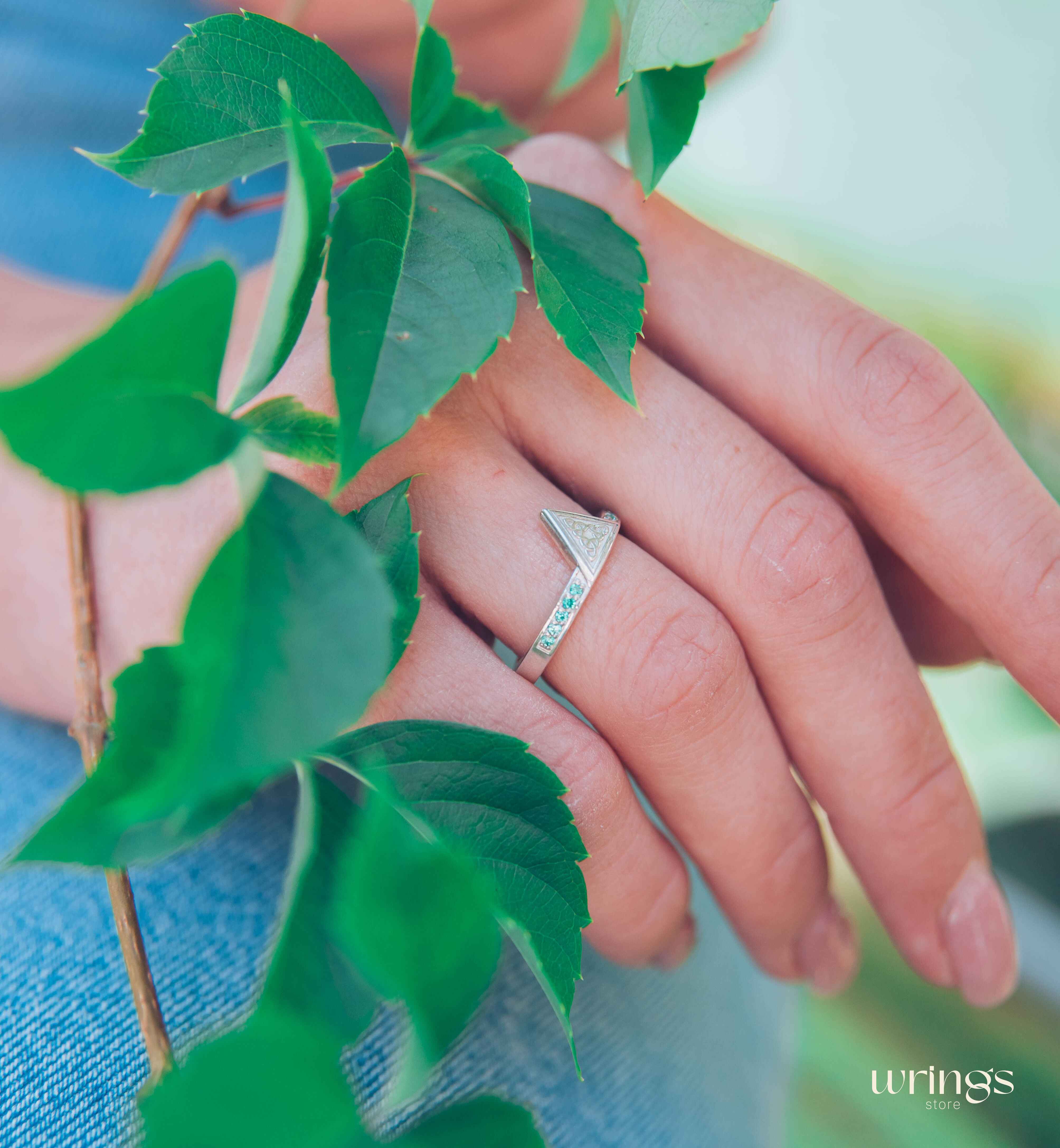 Engraved Celtic Trinity Triangle Ring with Side Emeralds