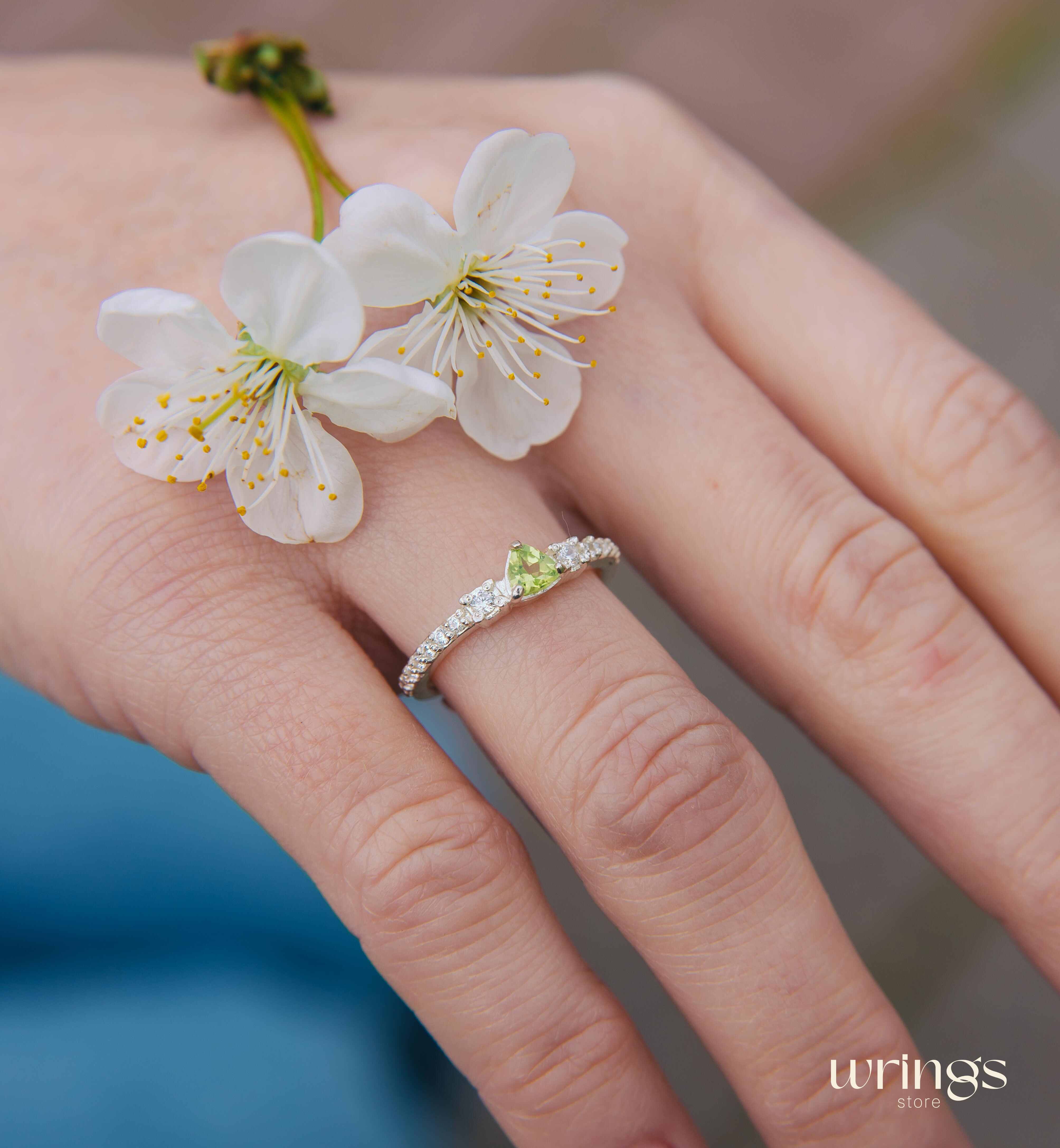 Small Central Peridot Three Stone Engagement Ring