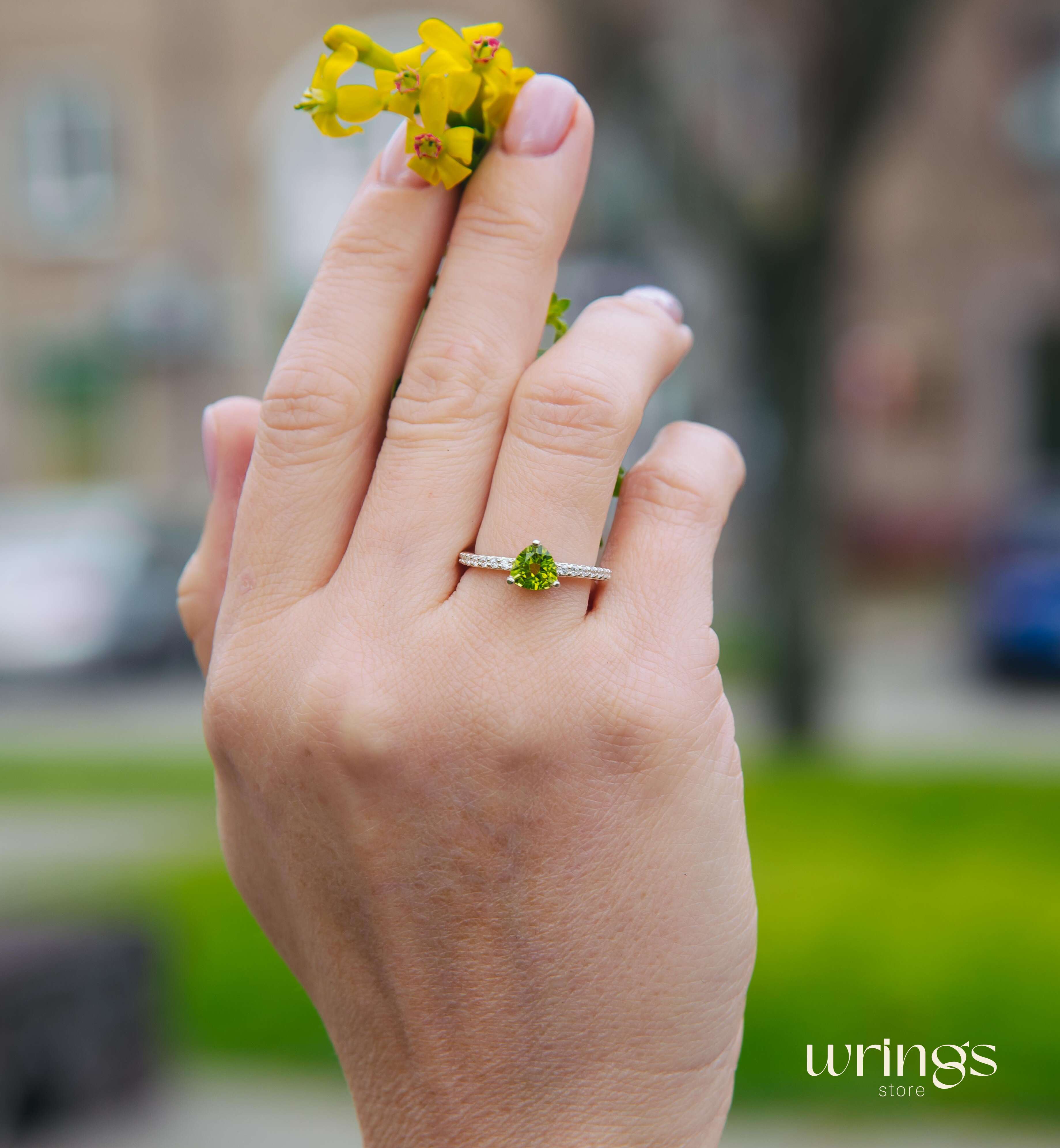 Trilliant Peridot Engagement Ring & CZ Side Stones