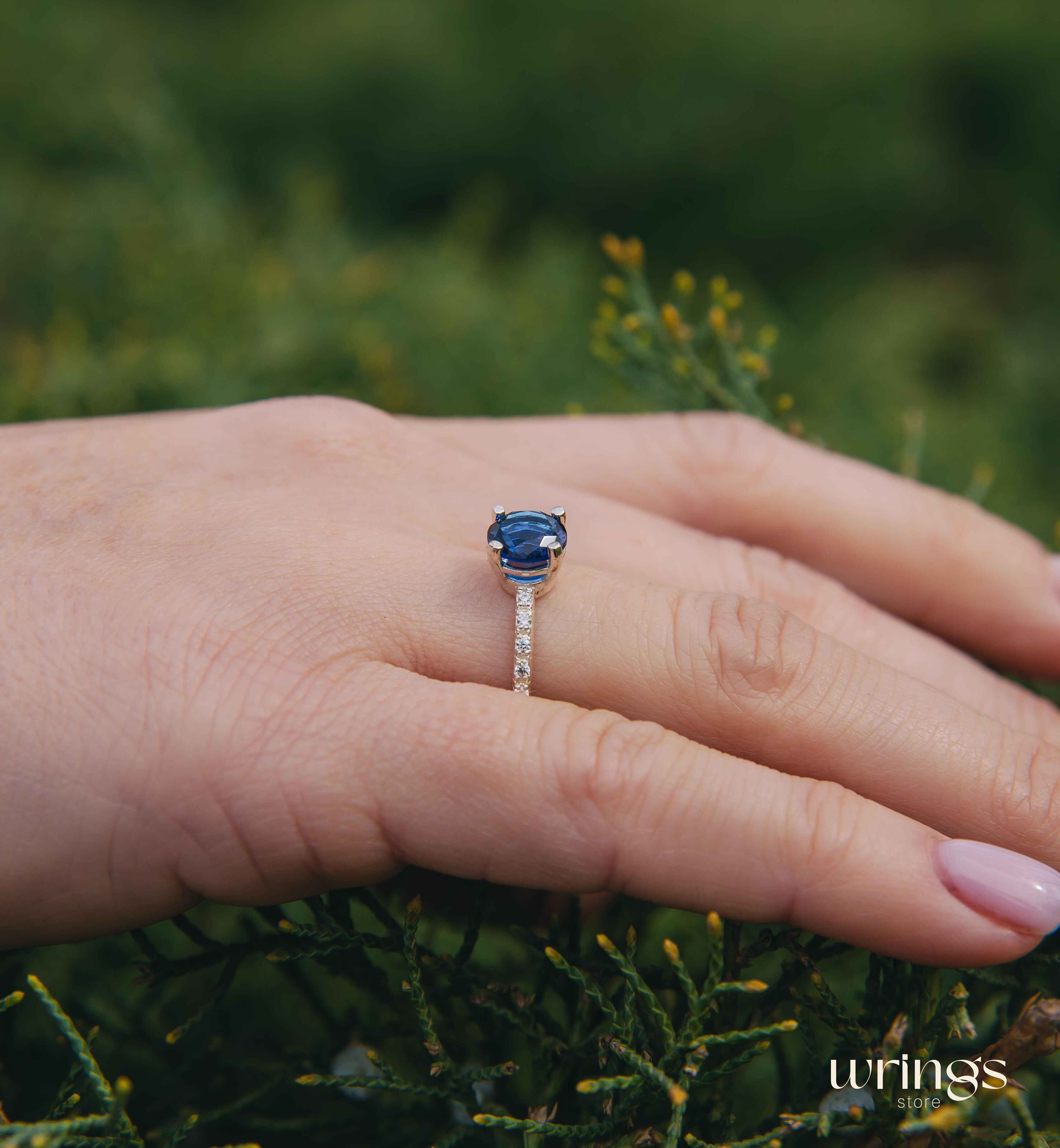 Large Simulated Sapphire Engagement Ring with Side Stones