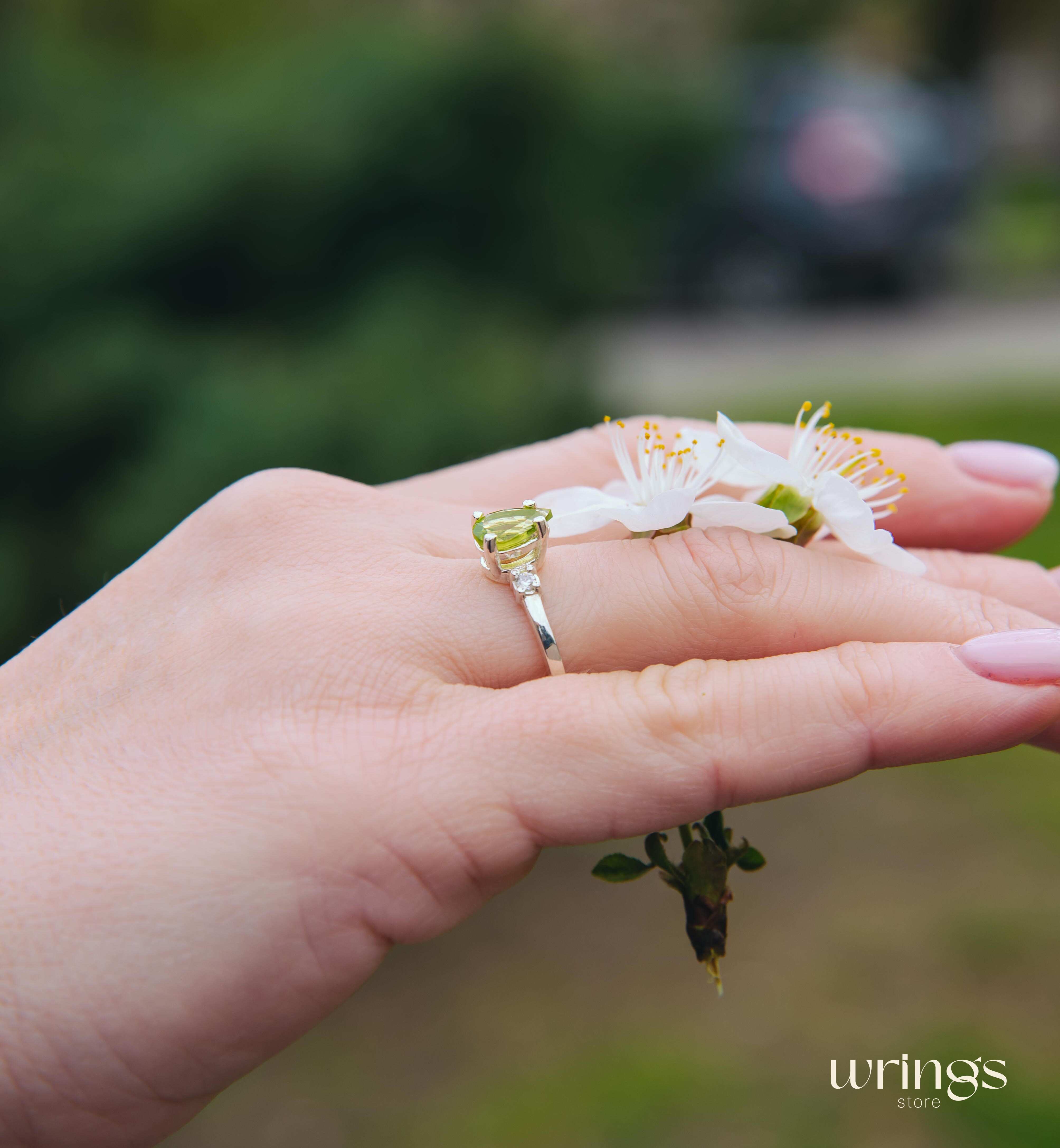 Large Pear Peridot Three Stone Engagement Ring Silver