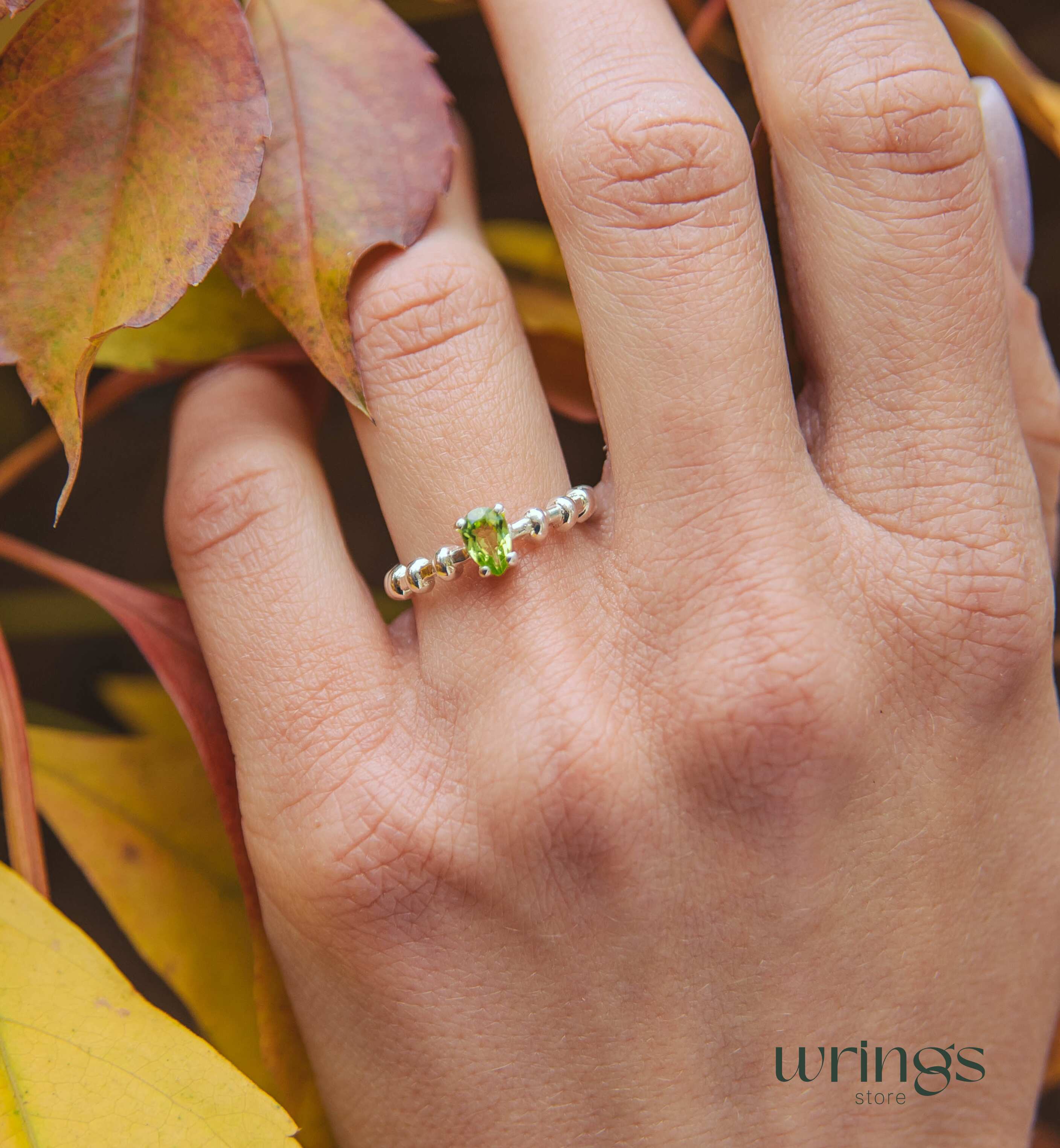 Pear shape Peridot Engagement Ring Silver Beaded Band