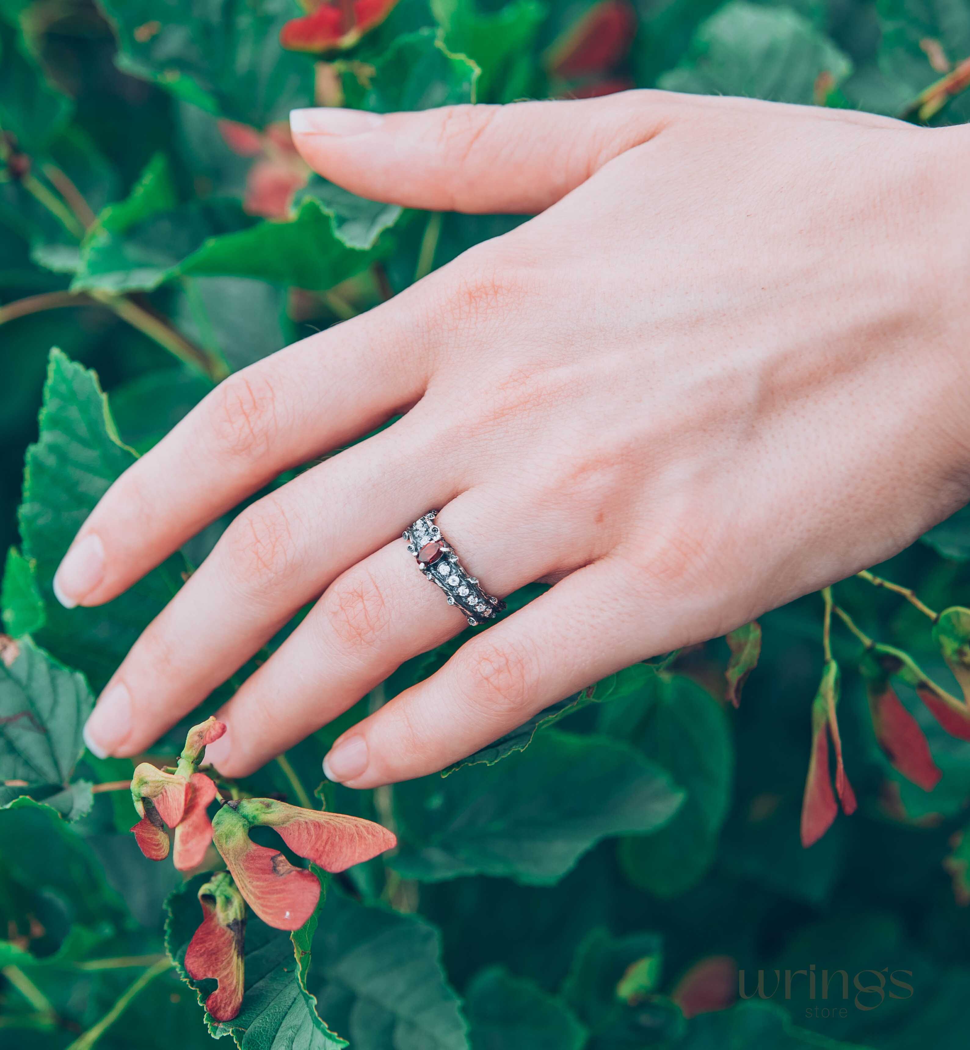 Knot and Branch Garnet Engagement Ring with Side Stones