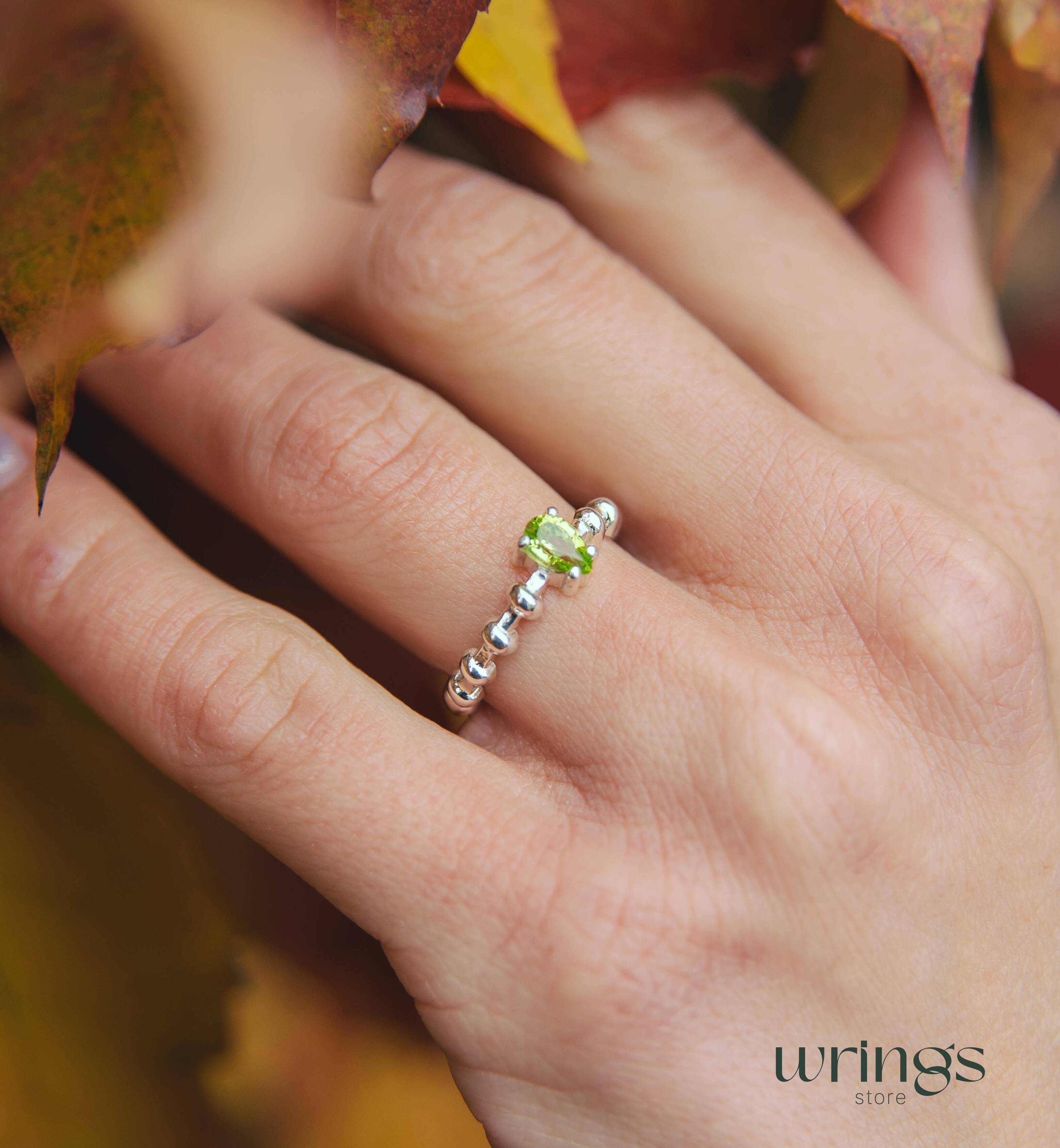 Pear shape Peridot Engagement Ring Silver Beaded Band