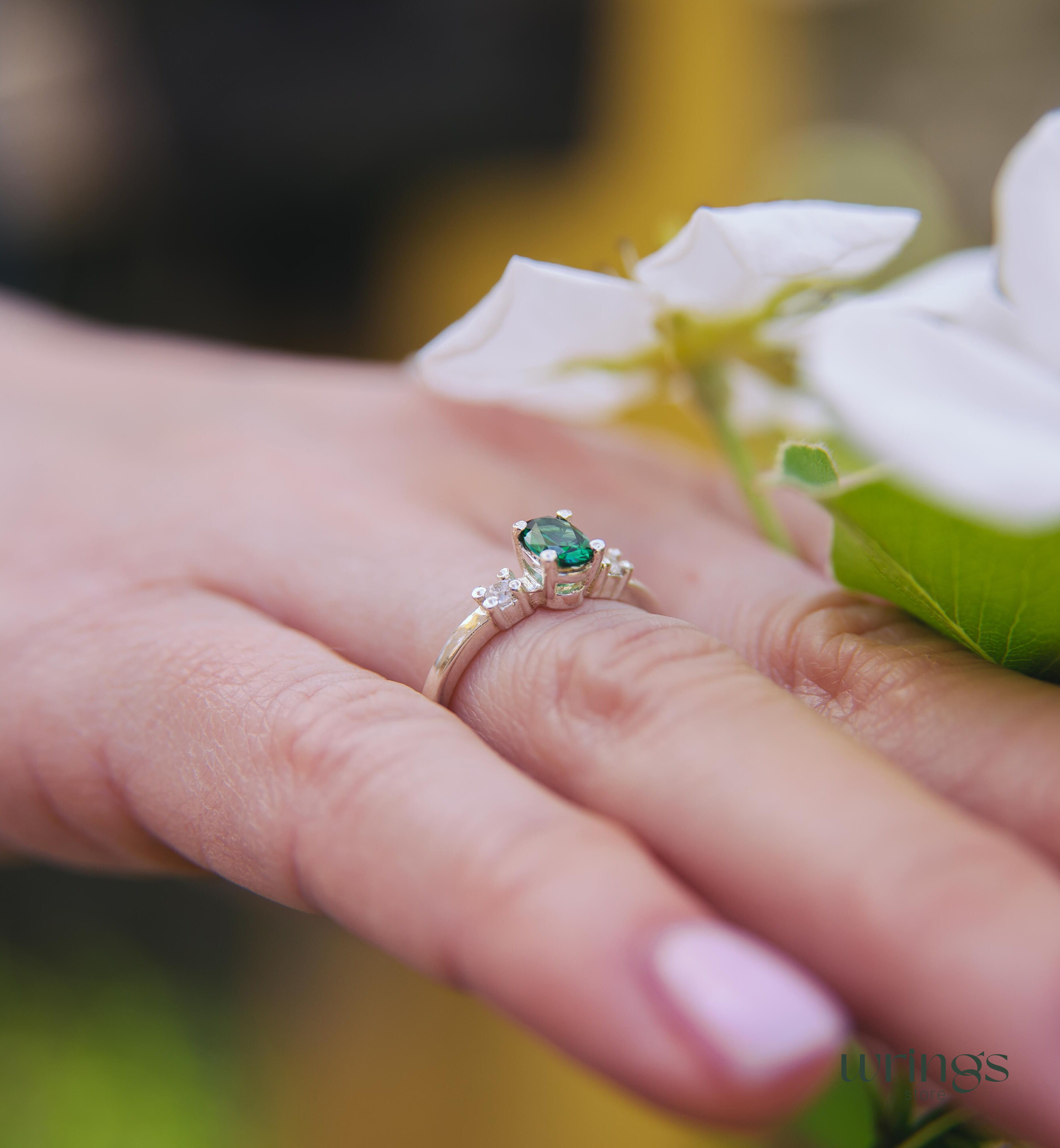 Vertical Oval LG Green Tourmaline Ring & Side Stones