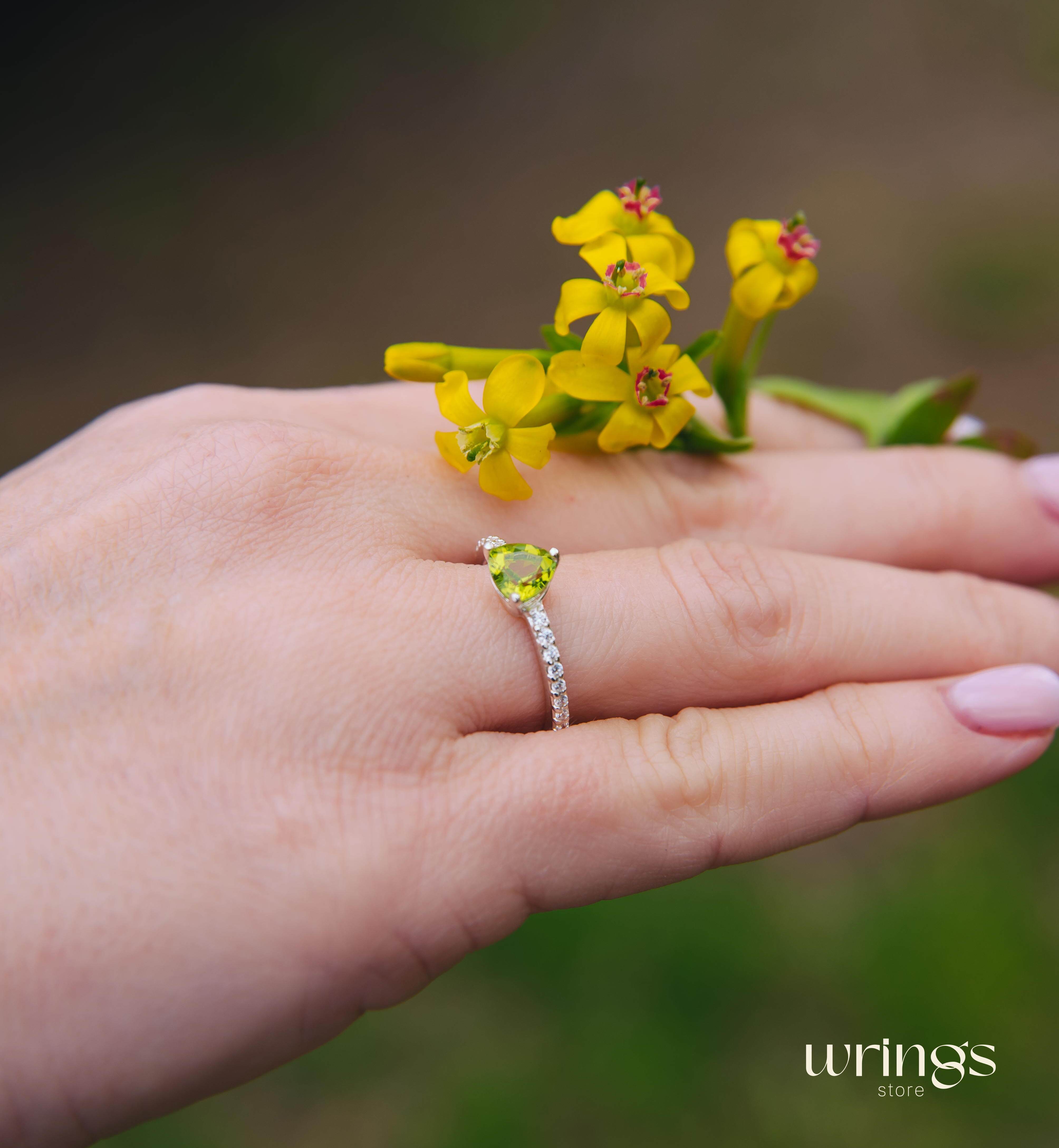 Trilliant Peridot Engagement Ring & CZ Side Stones