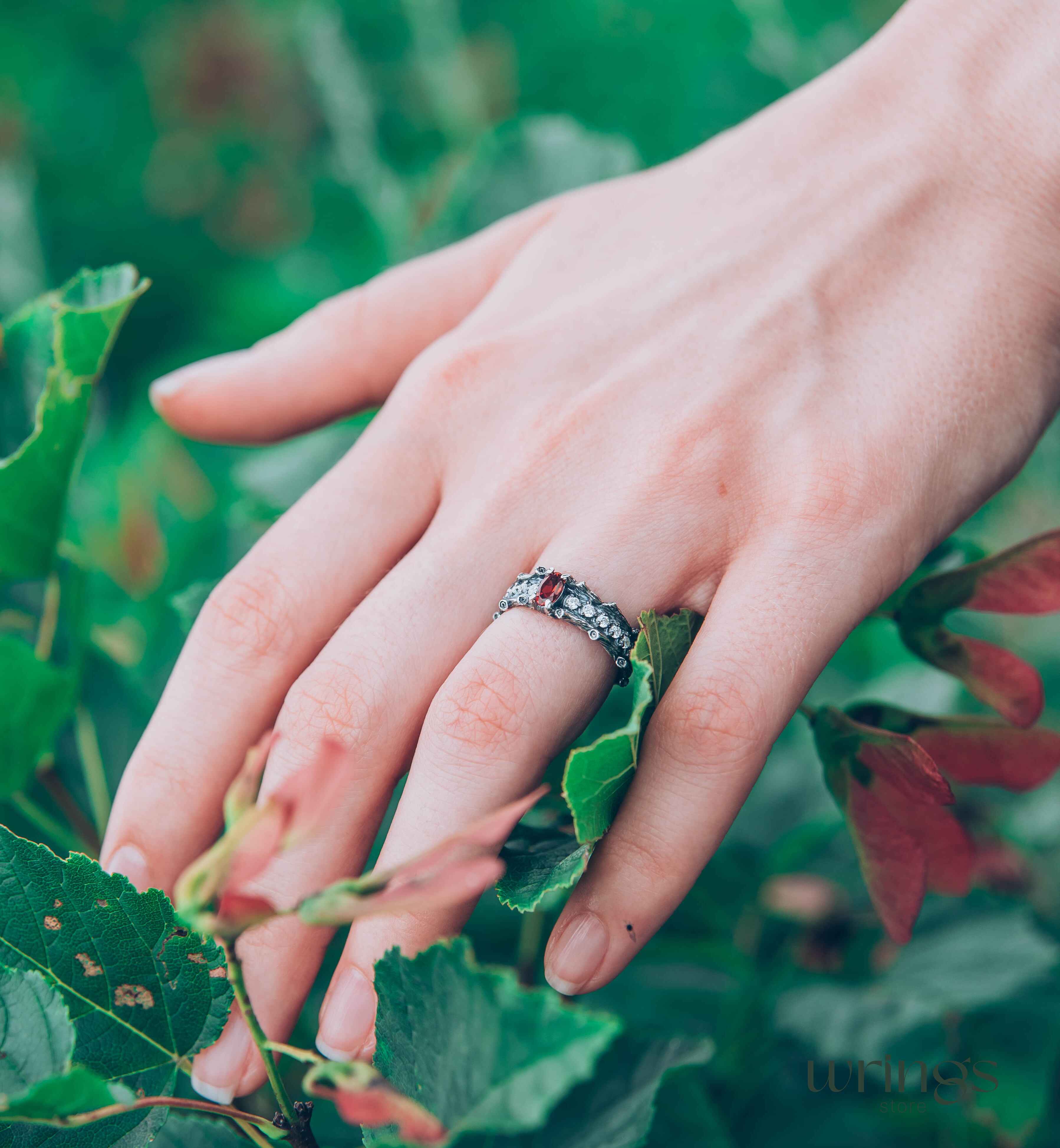 Knot and Branch Garnet Engagement Ring with Side Stones