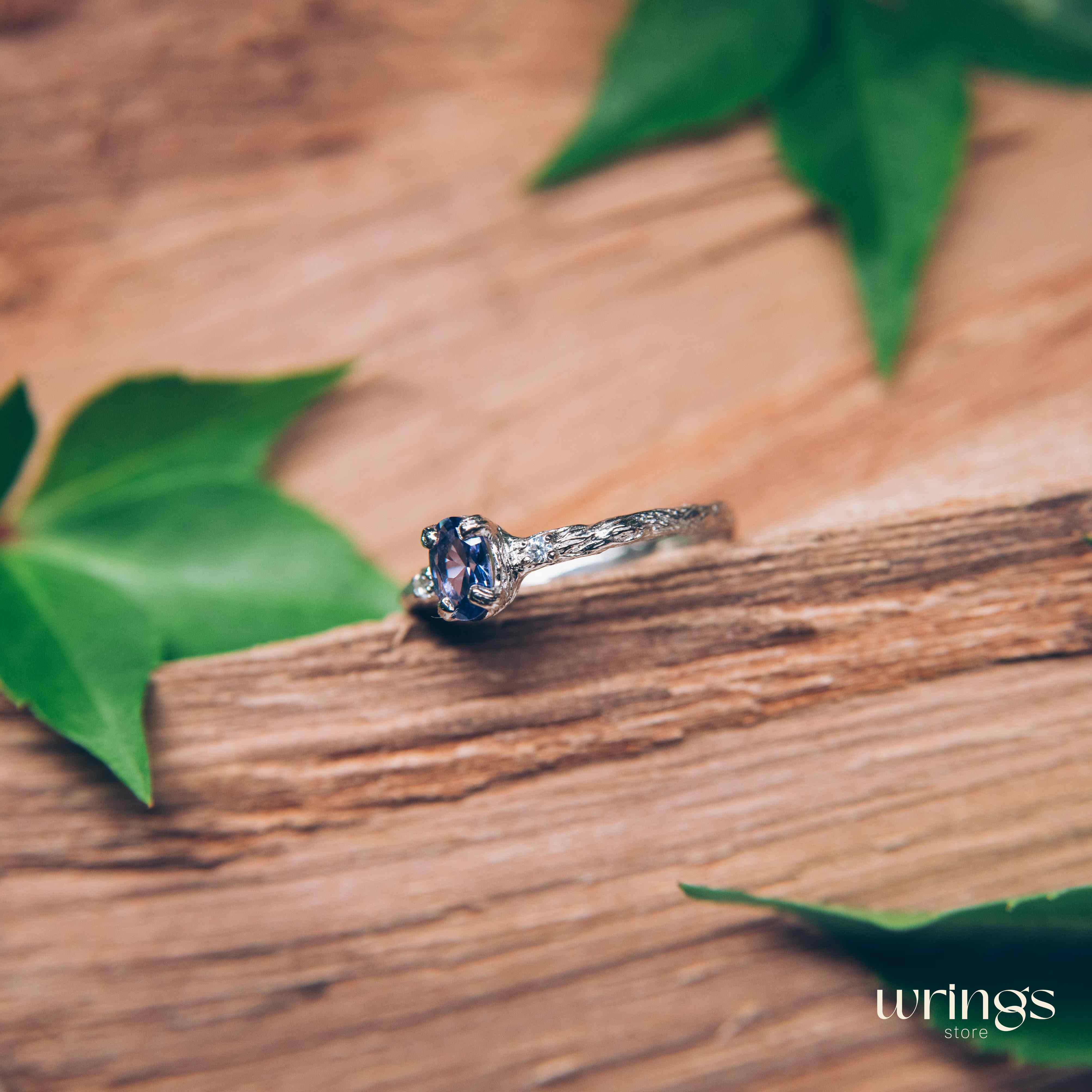 Tanzanite in Small Silver Twig Ring & CZ Side Stones