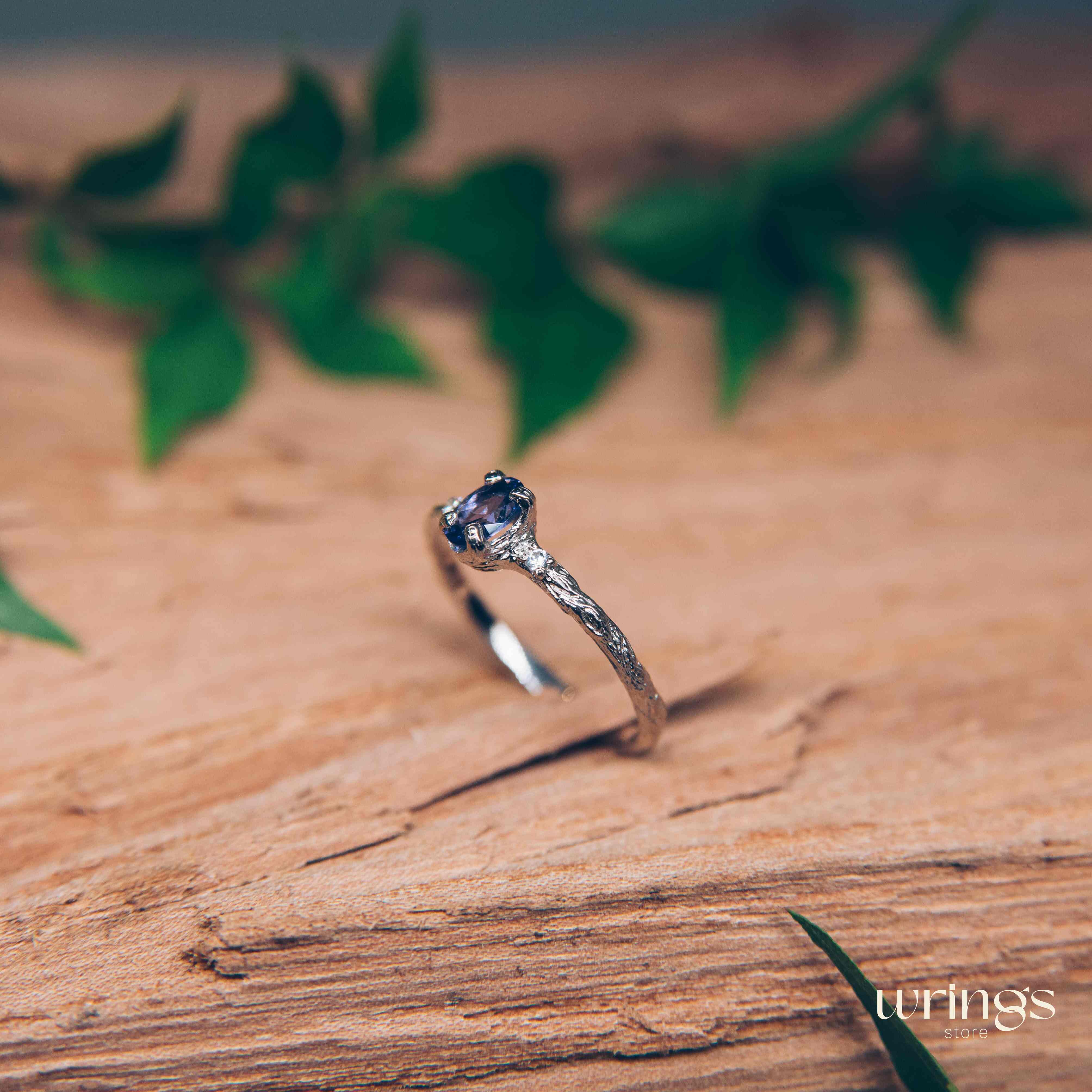 Tanzanite in Small Silver Twig Ring & CZ Side Stones