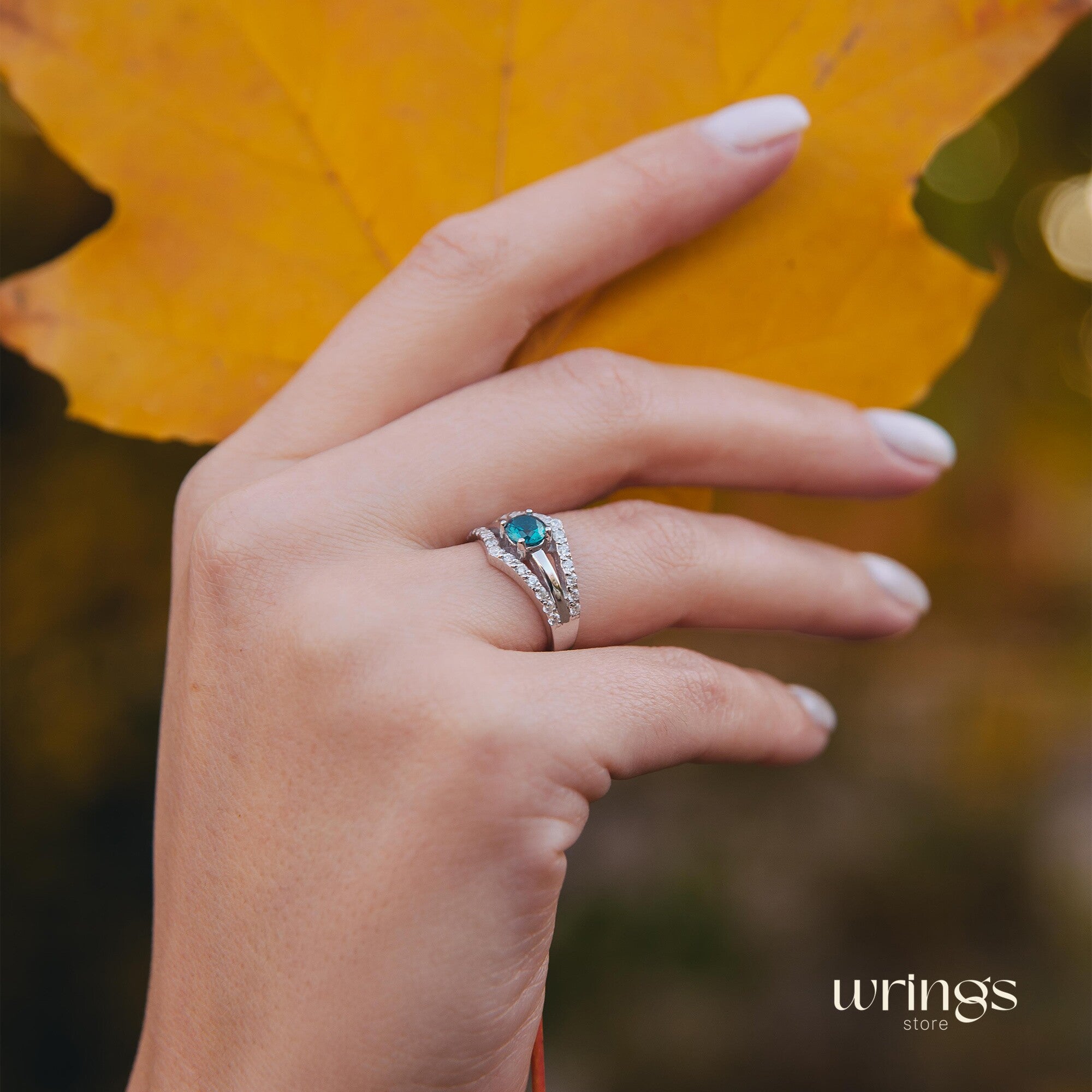 Double Chevron Engagement Ring - Oval Blue Topaz & CZ