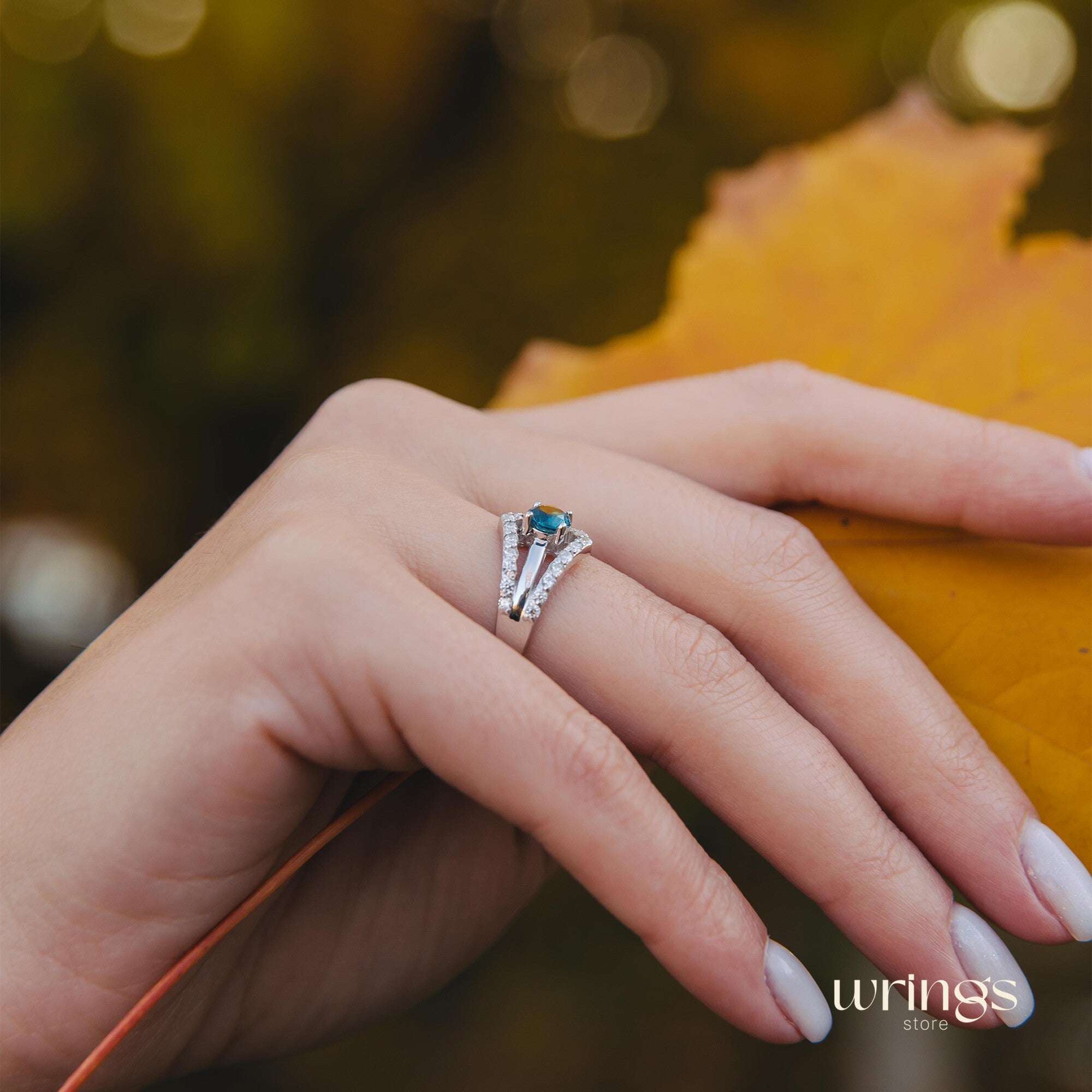 Double Chevron Engagement Ring - Oval Blue Topaz & CZ