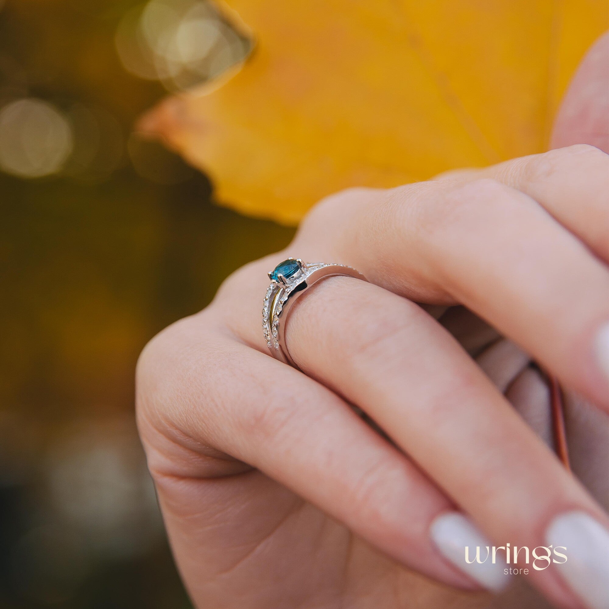 Double Chevron Engagement Ring - Oval Blue Topaz & CZ