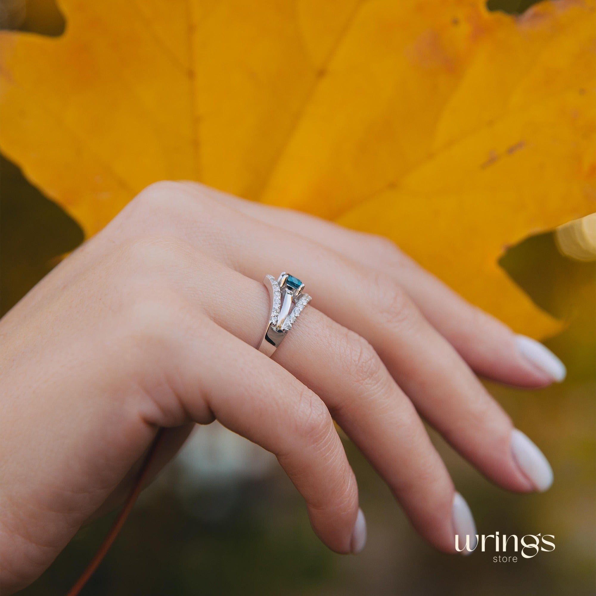 Double Chevron Engagement Ring - Oval Blue Topaz & CZ