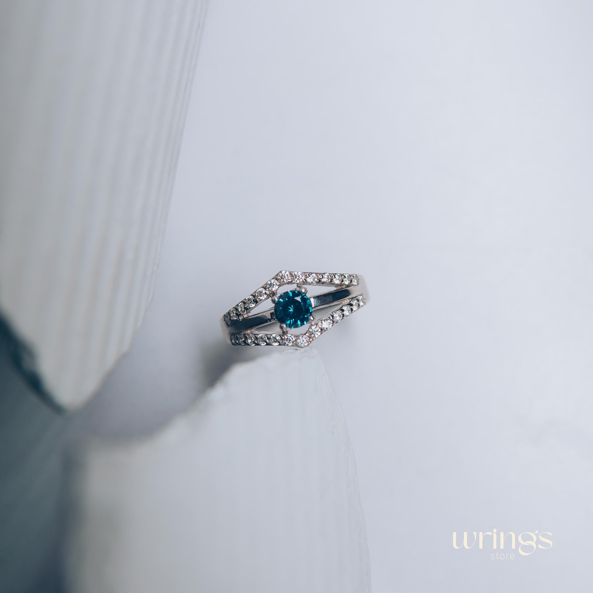 Double Chevron Engagement Ring - Oval Blue Topaz & CZ