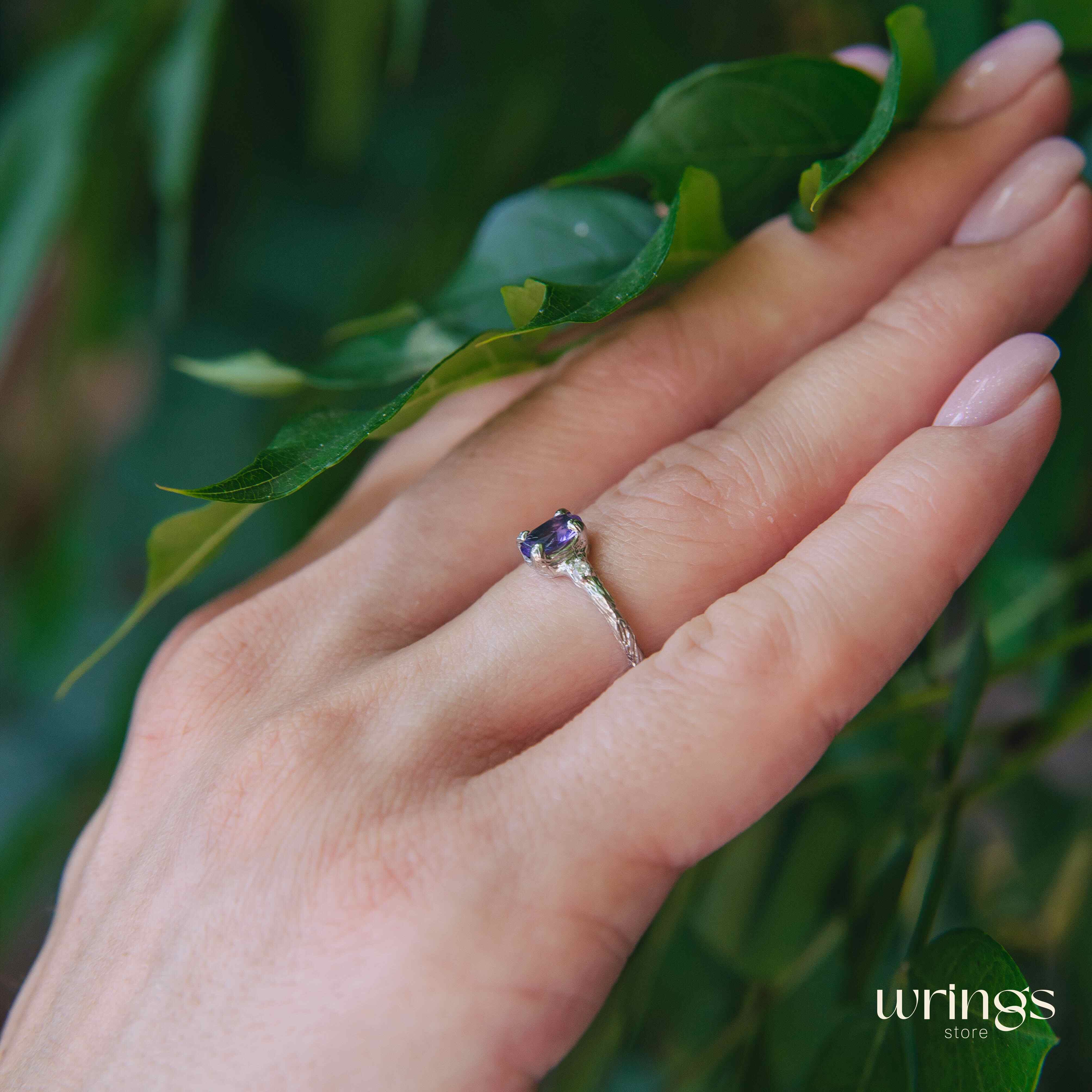 Tanzanite in Small Silver Twig Ring & CZ Side Stones