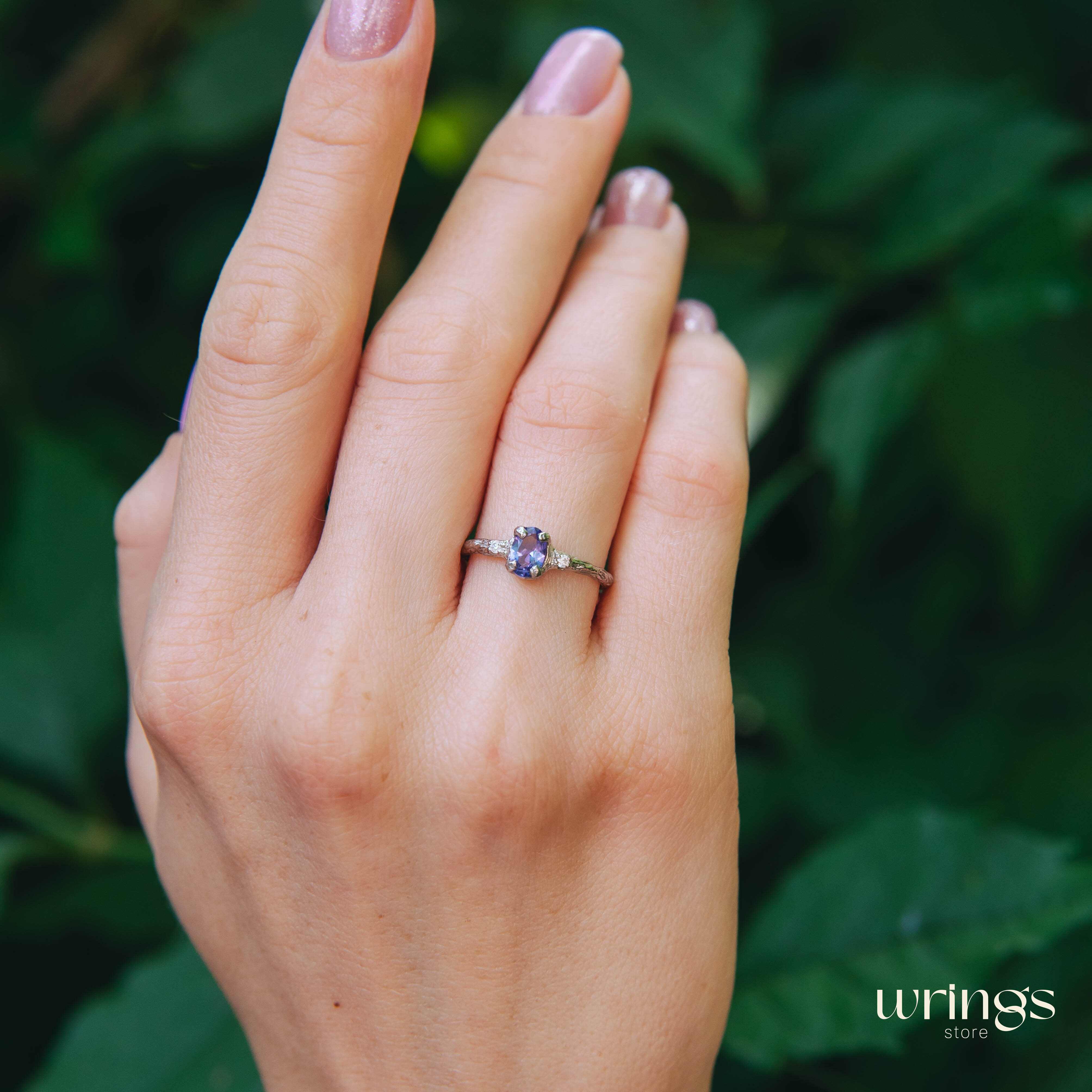 Tanzanite in Small Silver Twig Ring & CZ Side Stones