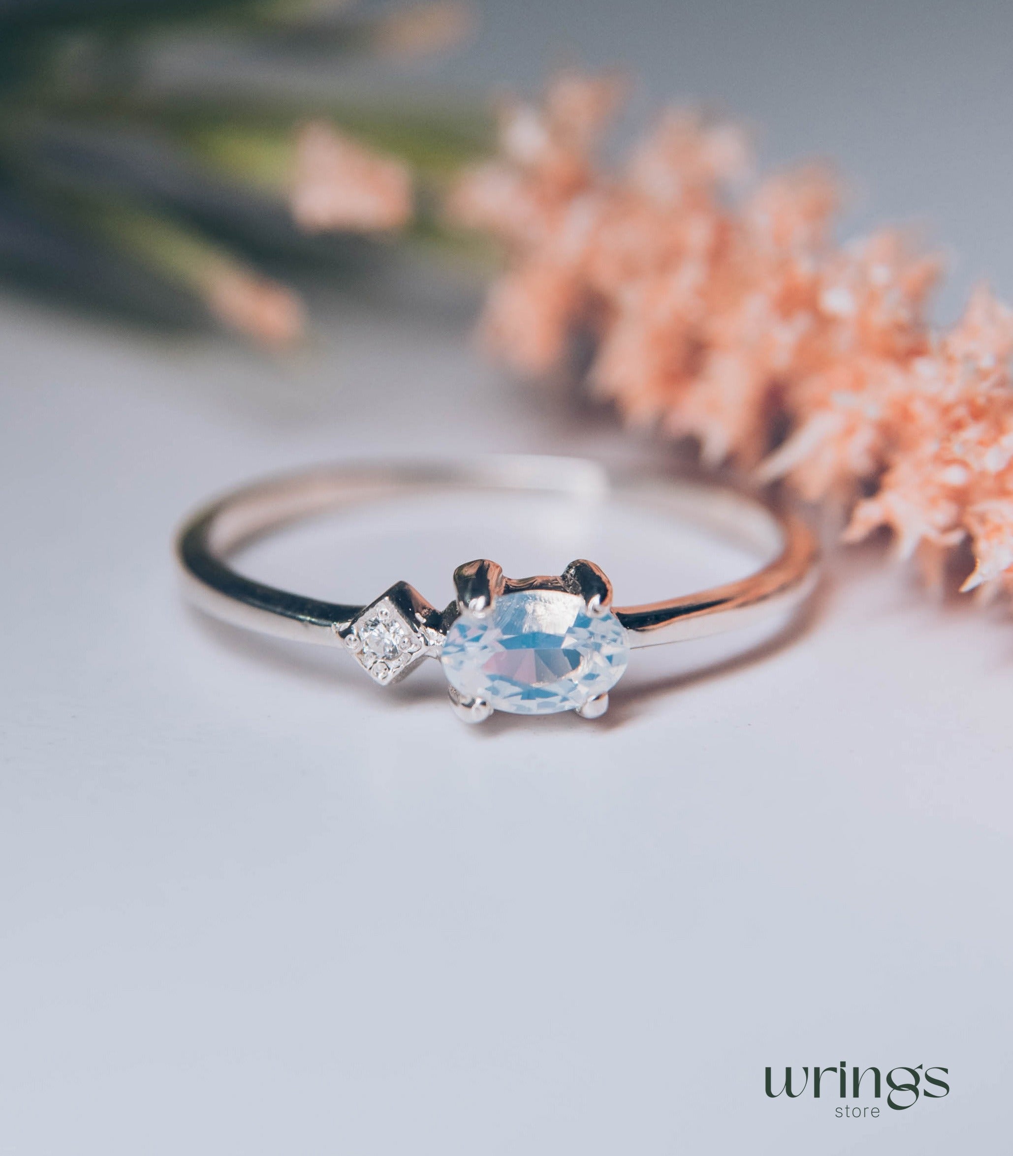 Silver Moon Stone Engagement Ring with Side Cubic Zirconia