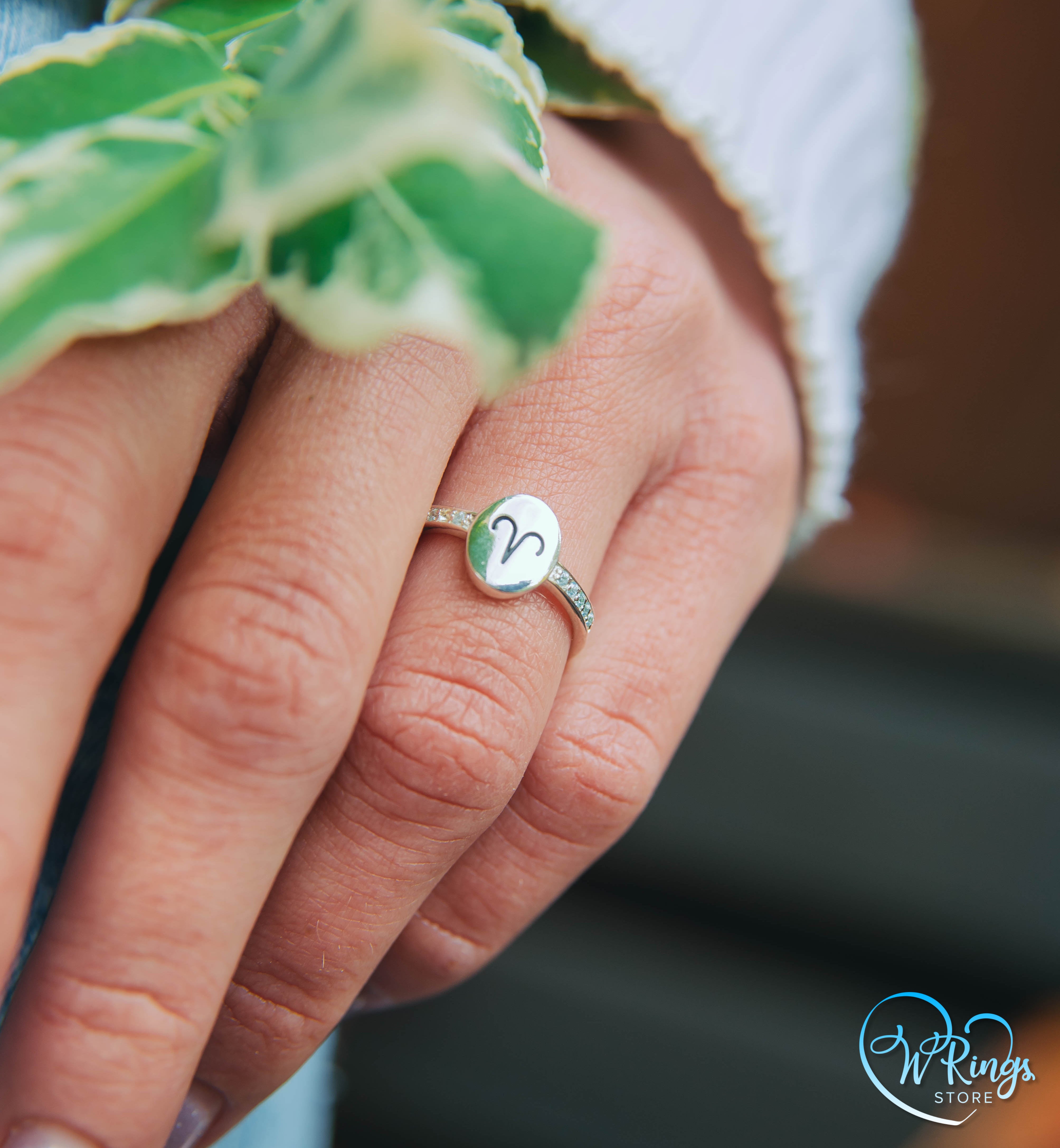 Oval shape Aries Signet Ring in Sterling Silver & Side Topazes