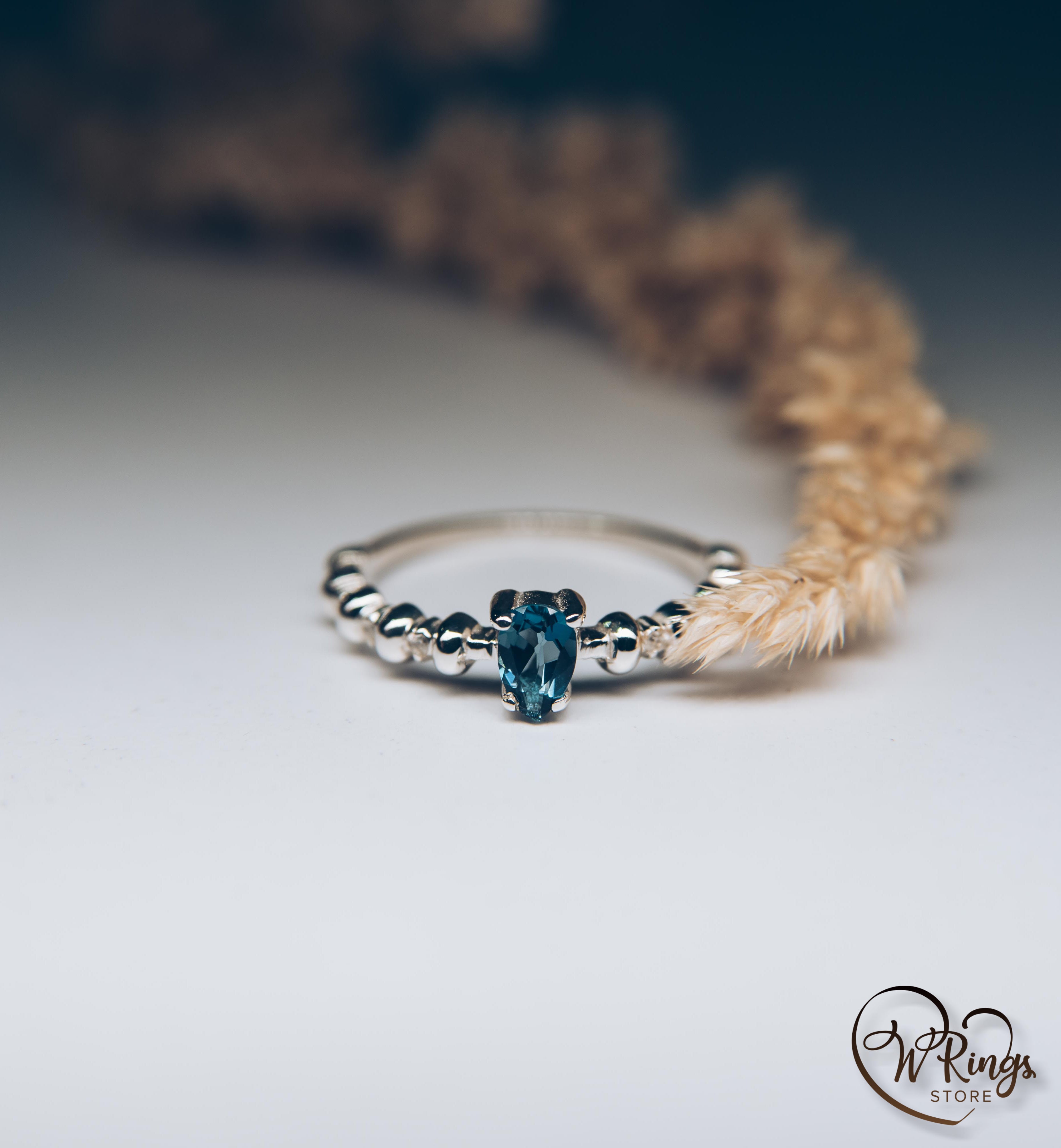 Pear London Blue Topaz Engagement Ring in Silver with Accent Stones