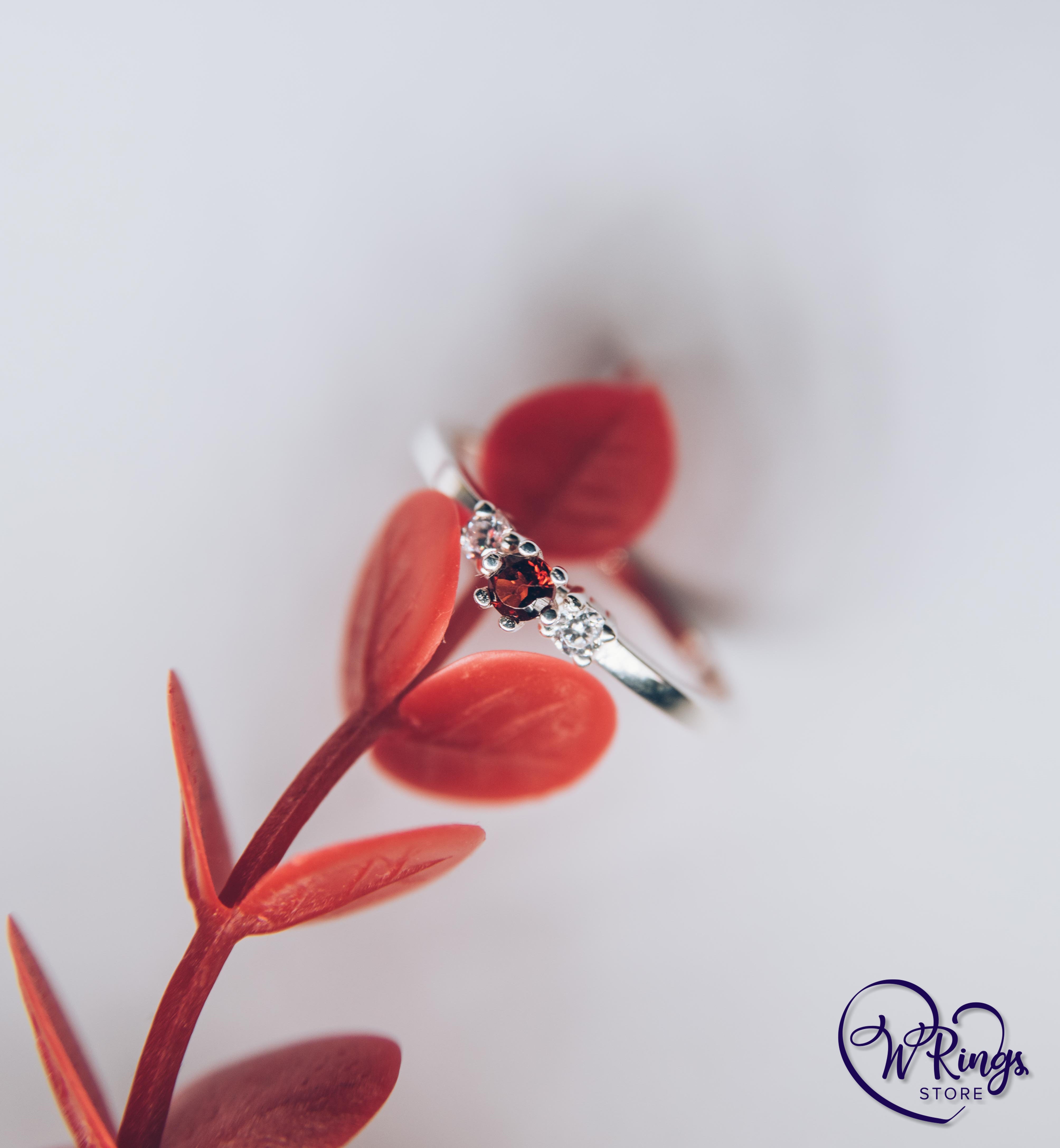 Round Garnet Three Stone Engagement Ring in Silver